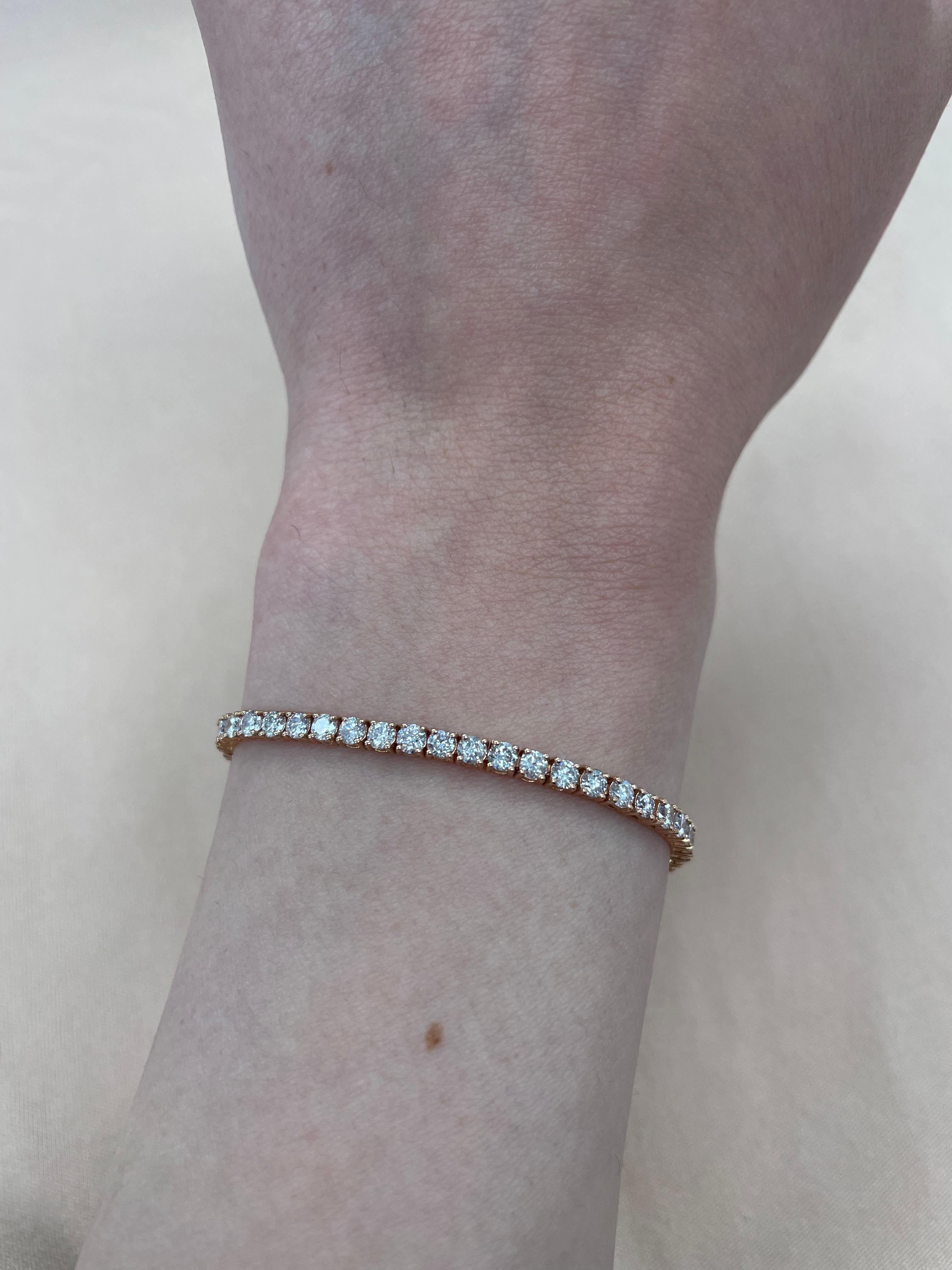 Exquisite and timeless diamonds tennis bracelet, by Alexander Beverly Hills.
62 round brilliant diamonds, 4.30 carats total. Approximately Very Light Pink color (looks like regular white diamonds in mounting) and SI clarity. Four prong set in 14k