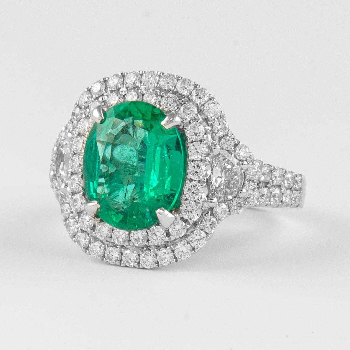 Contemporary Alexander 4.36ctt Emerald with Diamond Three Stone Halo Ring 18 Karat Gold