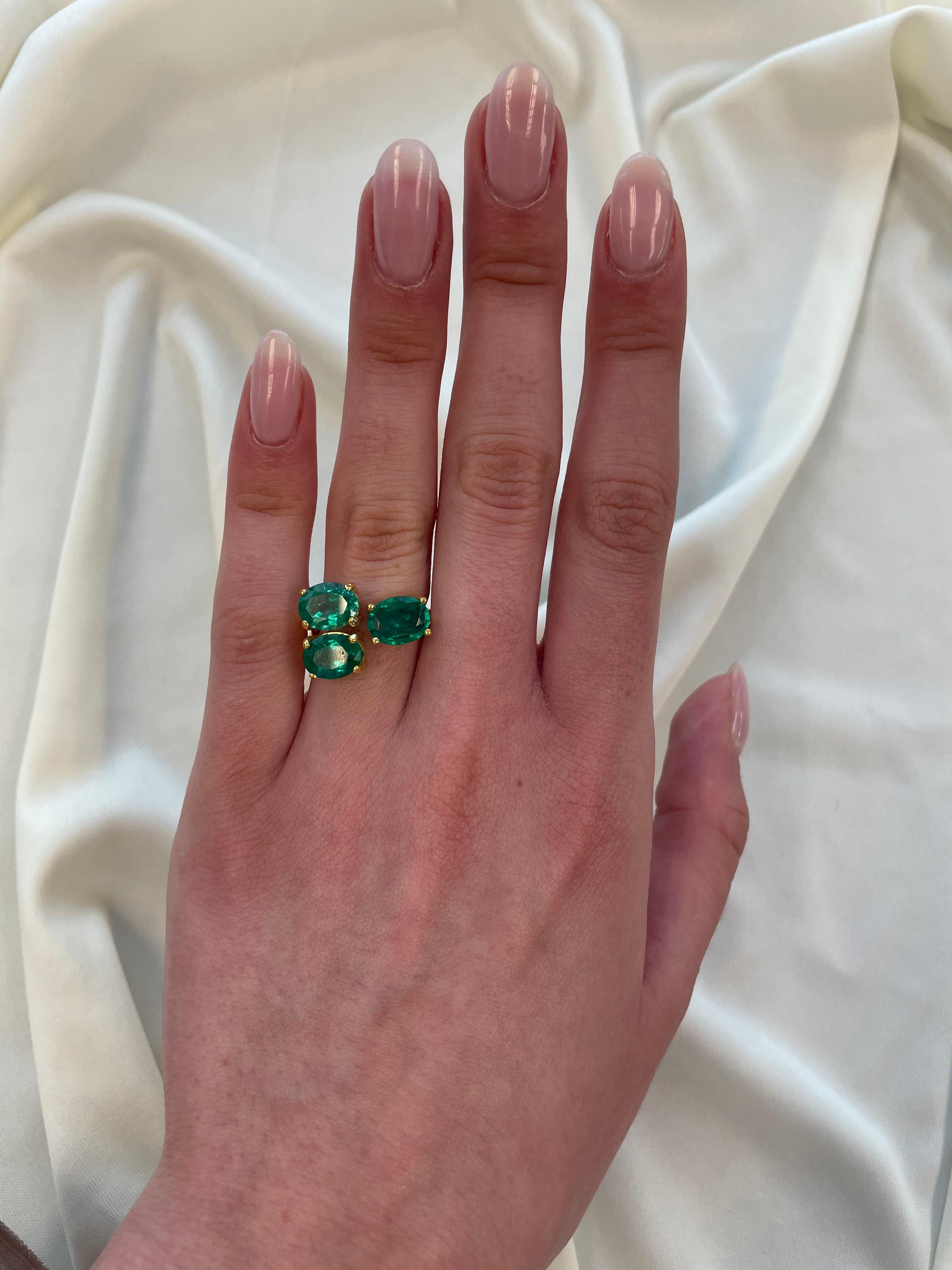 Stunning modern floating emerald and diamond toi et moi ring. By Alexander Beverly Hills.
3 oval emeralds, 4.49 carats apx F2. 18-karat yellow gold, 6.79 grams, current ring size 6.
Accommodated with an up-to-date appraisal by a GIA G.G. once