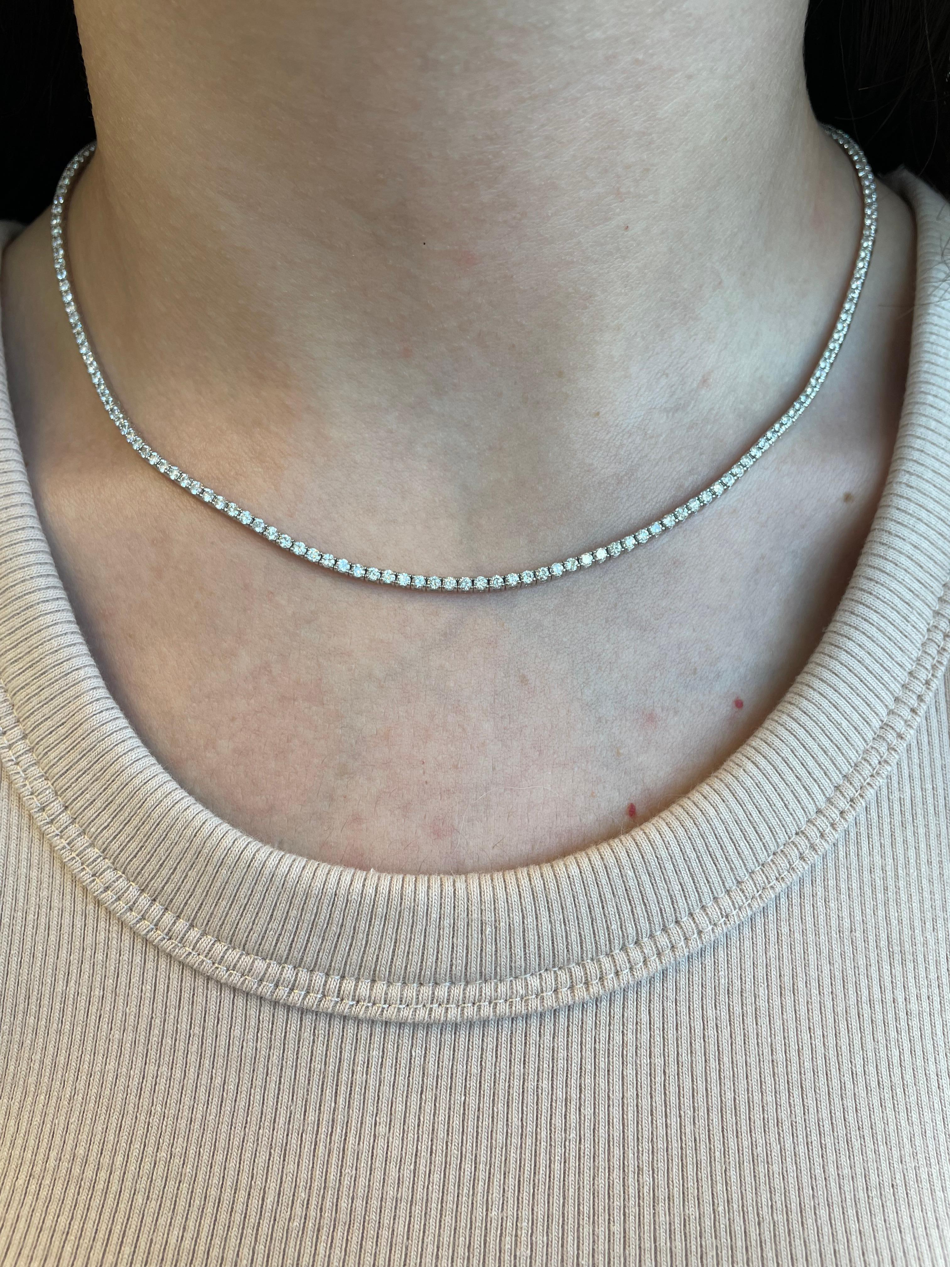 Beautiful modern diamond tennis necklace. By Alexander Beverly Hills.
4.75 carats of round brilliant diamonds, approximately G/H color and SI clarity. 17 inches, 18k white gold.
Accommodated with an up to date appraisal by a GIA G.G., please contact