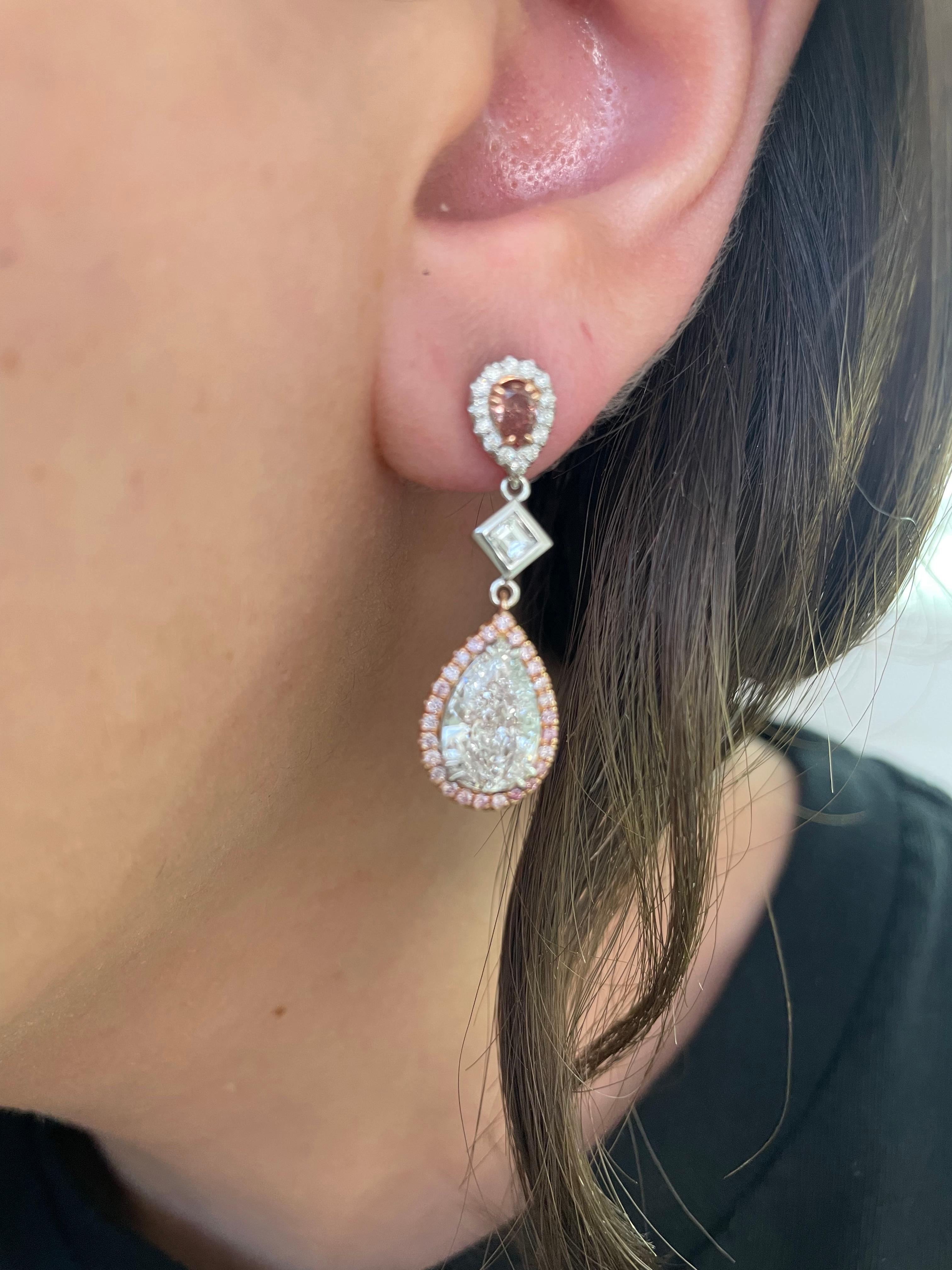 Stunning statement pear drop earrings with fancy deep and intense pink diamonds, GIA certified. High jewelry by Alexander Beverly Hills. 
5.11 carats total diamond weight.
Two pear shape diamonds 4.02 carats, GIA certified. Both F color grade and