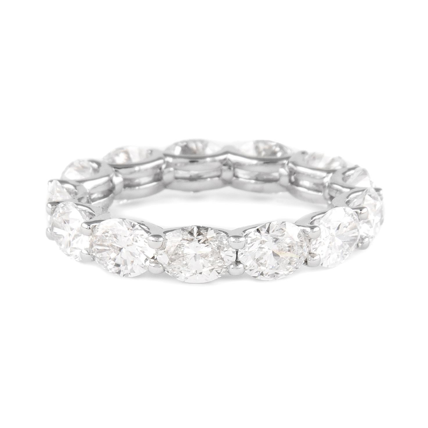 Stunning oval cut diamond eternity band, by Alexander Beverly Hills.
13 oval cut diamonds, 5.39 carats total. F/G color and VS clarity. Set in 18k white gold, 2.98 grams, size 7.5.
Accommodated with an up to date appraisal by a GIA G.G., upon