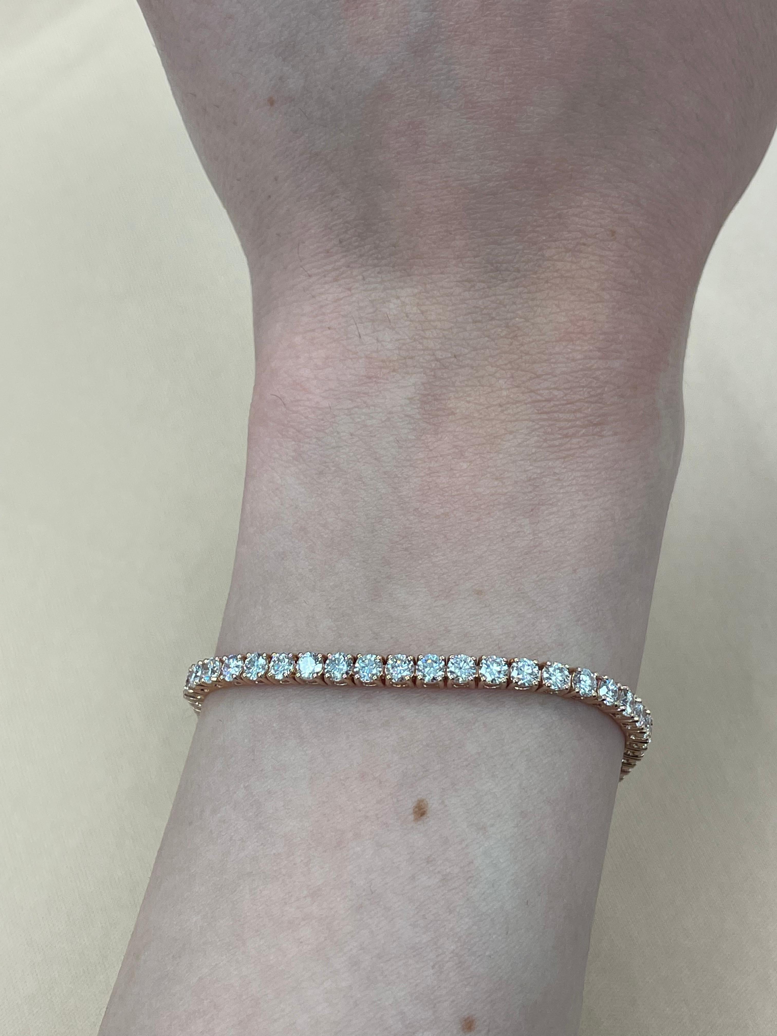 Exquisite and timeless diamonds tennis bracelet, by Alexander Beverly Hills.
57 round brilliant diamonds, 5.63 carats total. Approximately Very Light Pink color (looks like regular white diamonds in mounting) and VS2/SI1 clarity. Four prong set in