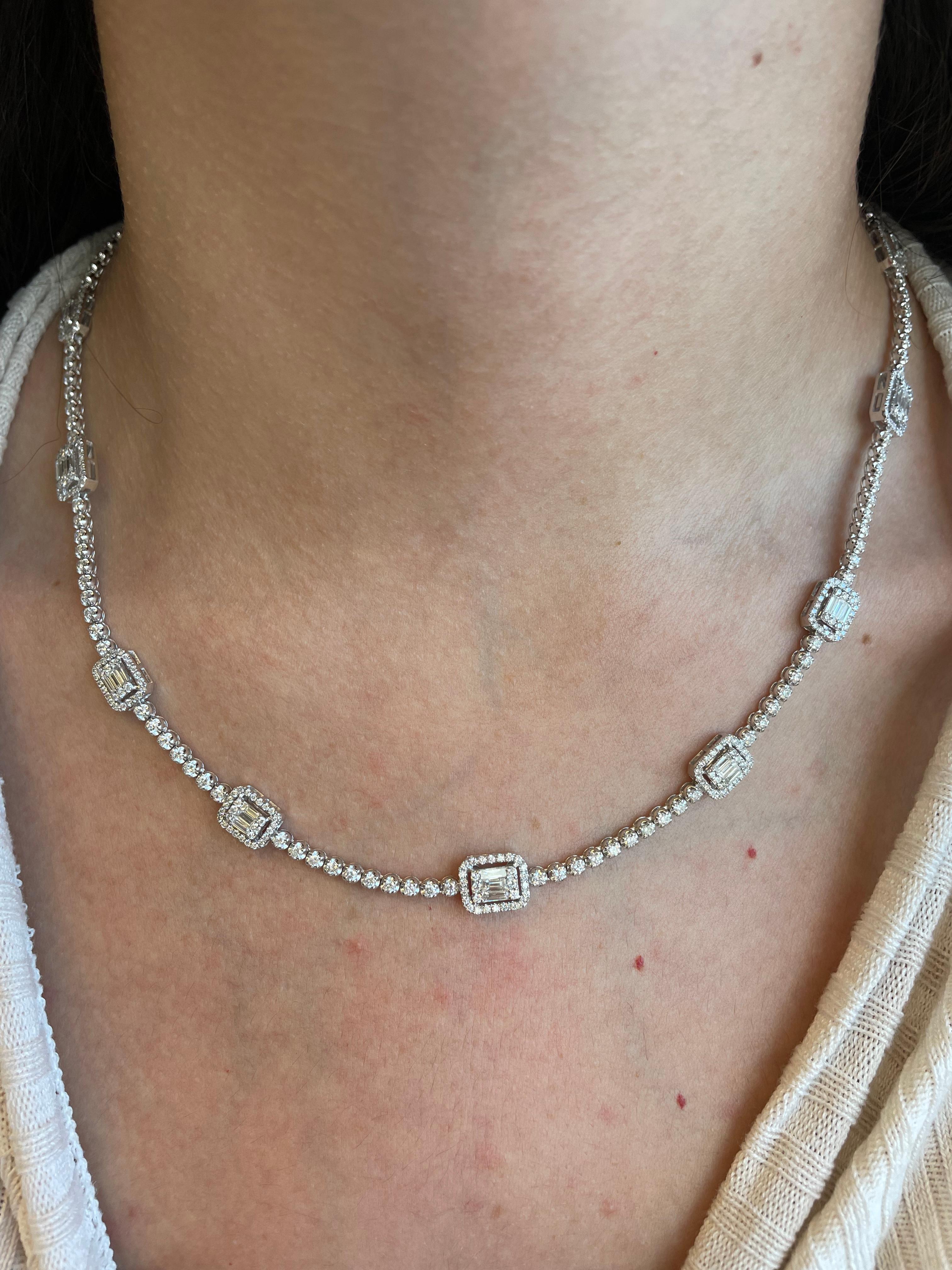 Exquisite and timeless diamonds tennis necklace with illusion set diamonds with the look of emerald cut diamonds. By Alexander Beverly Hills.
409 round, princess, and baguette shape diamonds, 5.88 carats total. Nine emerald cut shape diamond
