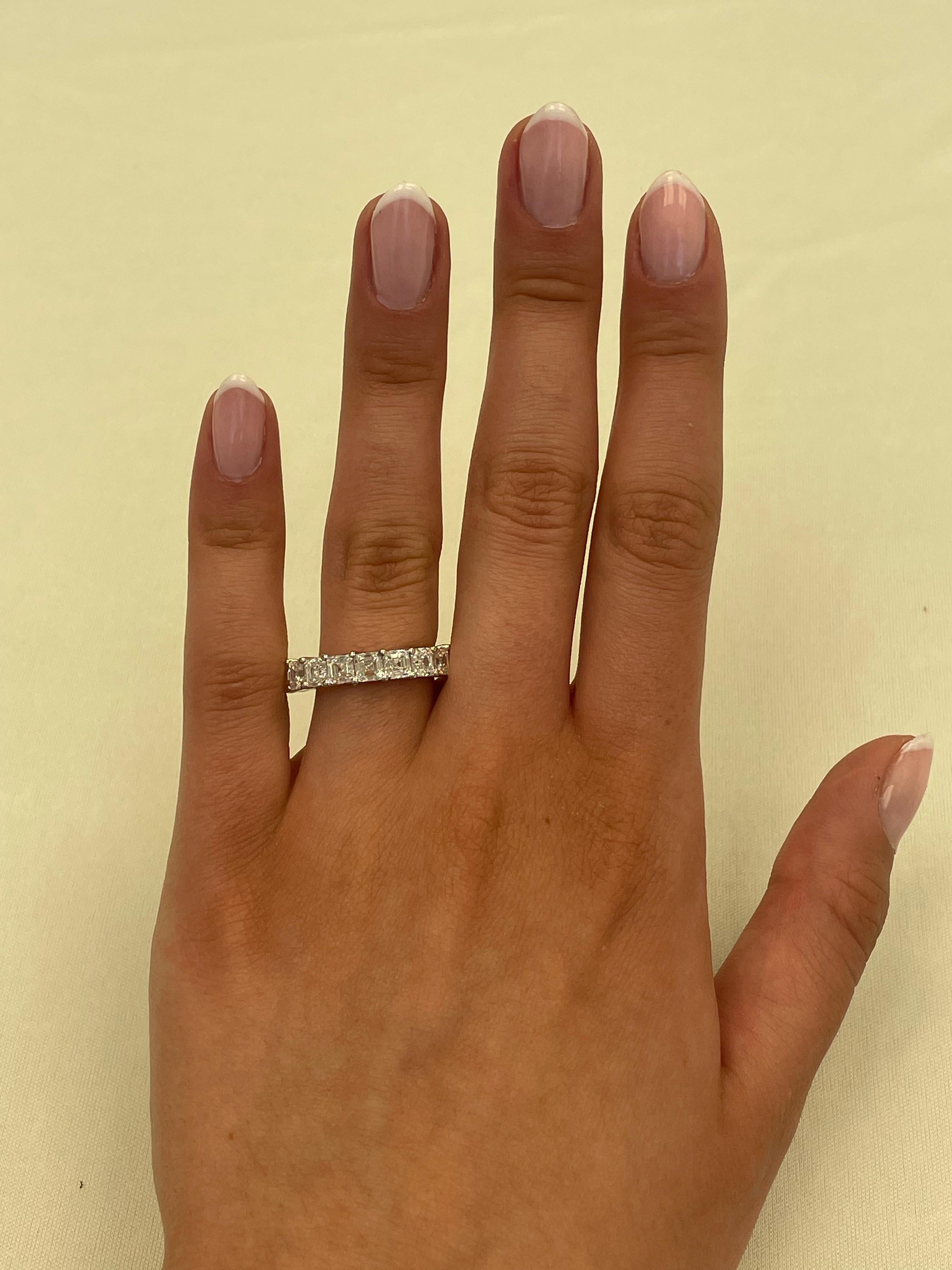 Stunning asscher cut diamond eternity band, By Alexander Beverly Hills.
19 asscher cut diamonds, 5.88 carats. D/E color and VVS clarity. 18-karat white gold, 5.86 grams, size 6.75. 
Accommodated with an up-to-date digital appraisal by a GIA G.G.