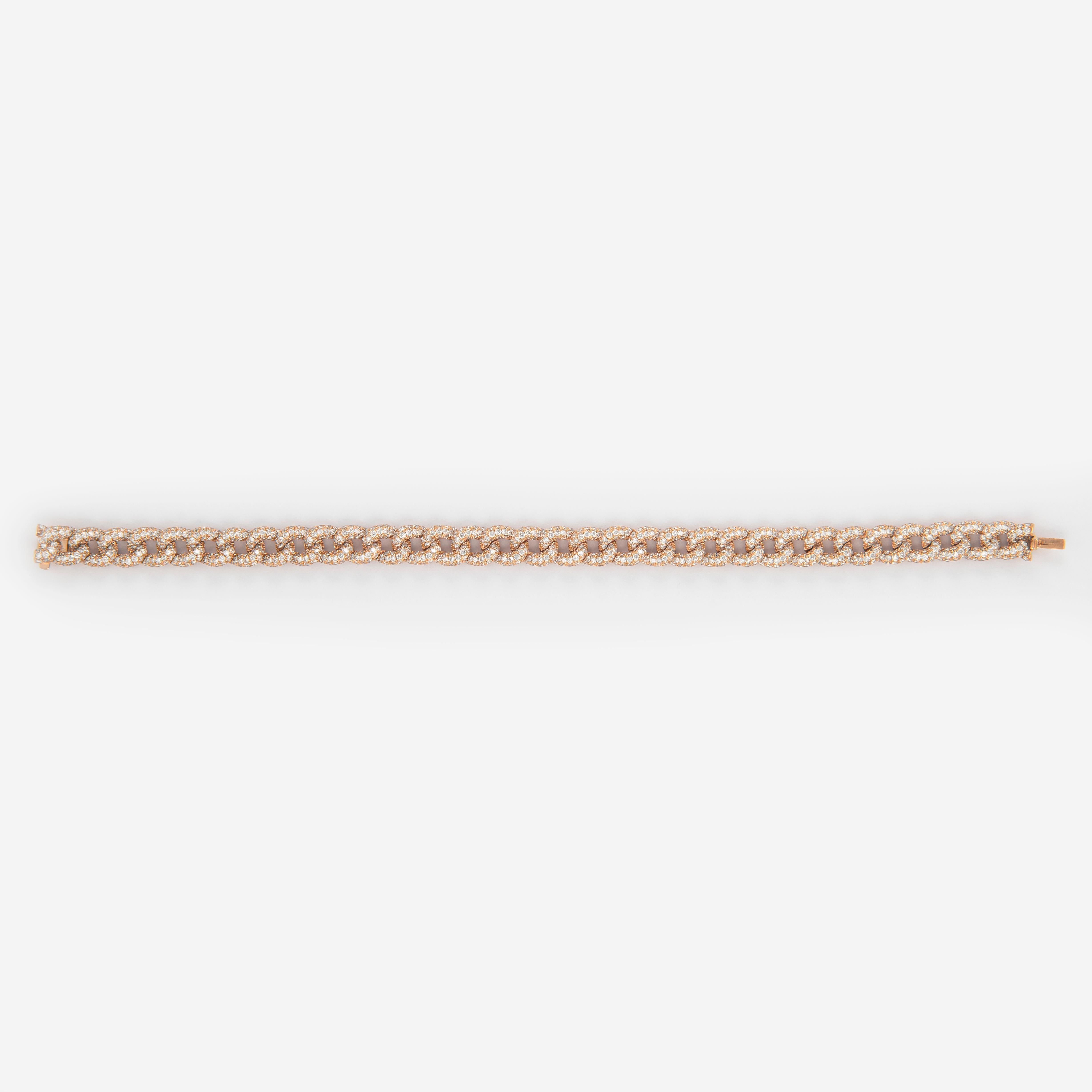 Modern diamond cuban link bracelet. By Alexander of Beverly Hills.
1043 round brilliant diamonds, 6.20 carats total. Approximately G/H color and SI clarity. 18k rose gold.
Accommodated with an up to date appraisal by a GIA G.G., please contact us