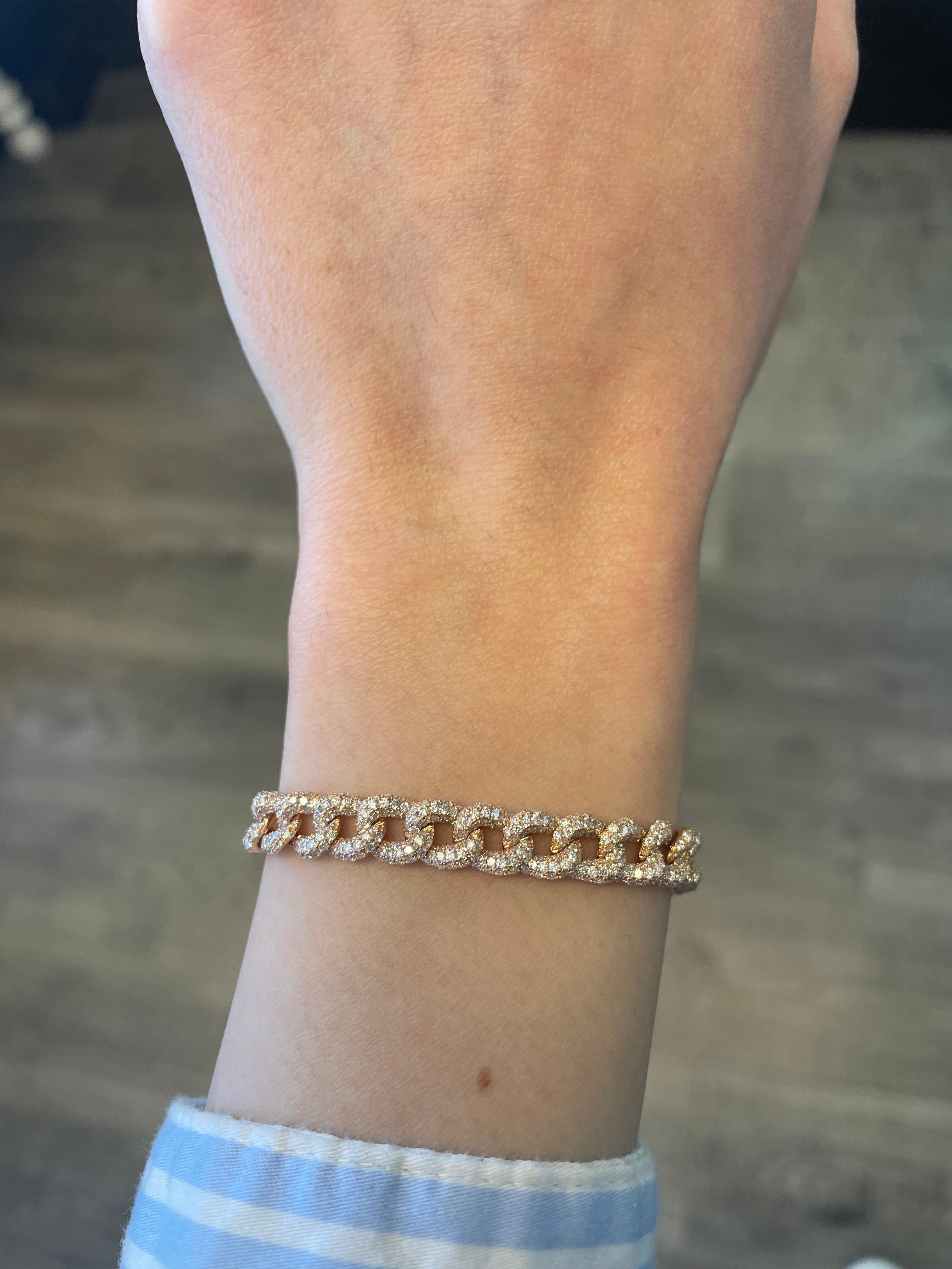 Modern diamond cuban link bracelet. By Alexander Beverly Hills.
1043 round brilliant diamonds, 6.24 carats total. Approximately G/H color and VS2/SI1 clarity. 18k rose gold, 18.77 grams, and 7mm width.
Accommodated with an up-to-date appraisal by a