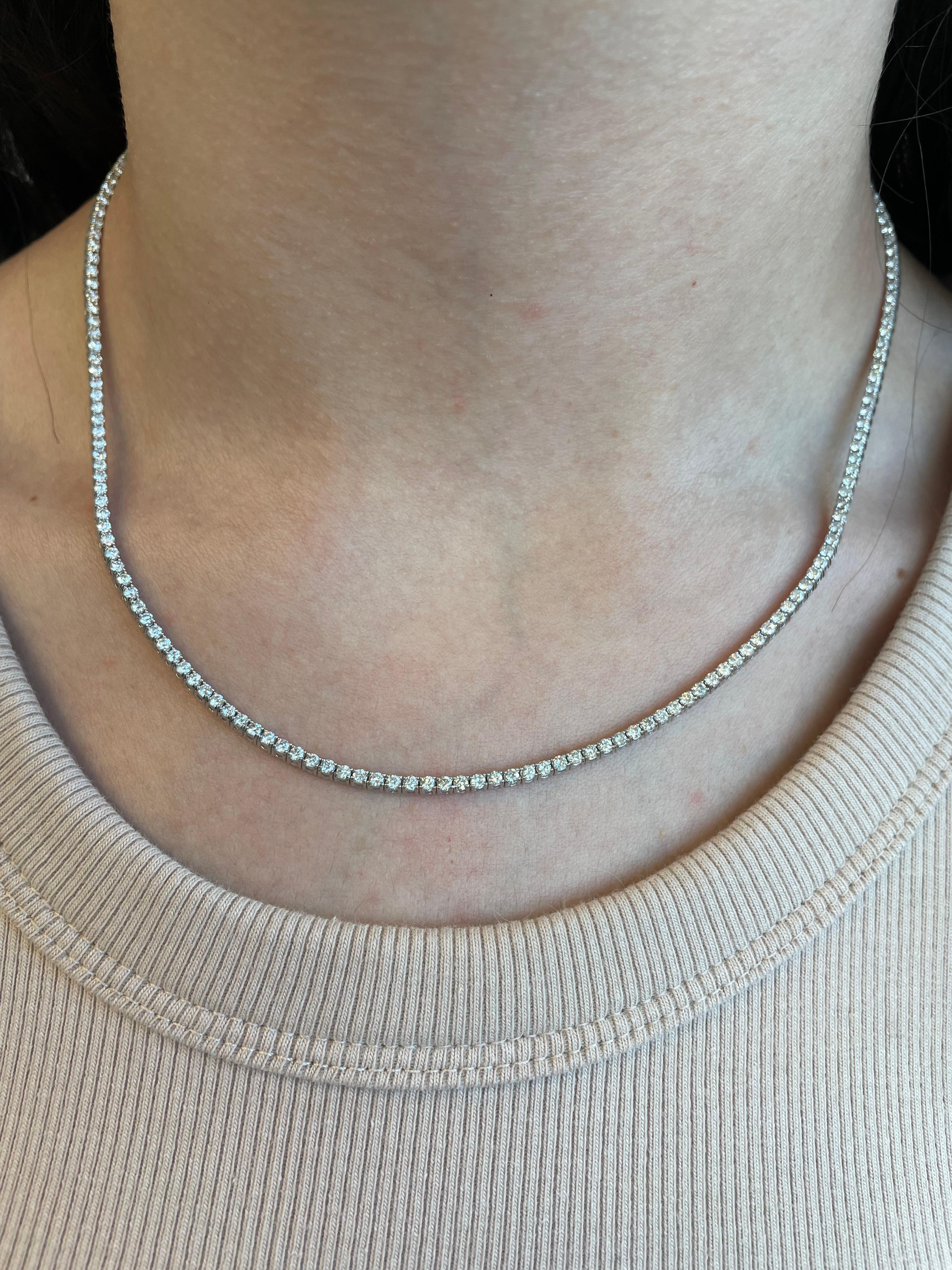 Beautiful and classic diamond tennis necklace. By Alexander Beverly Hills.
6.25 carats of round brilliant diamonds, approximately G/H color and SI clarity. 18k white gold, 19.76 grams, 17in.
Accommodated with an up-to-date appraisal by a GIA G.G.