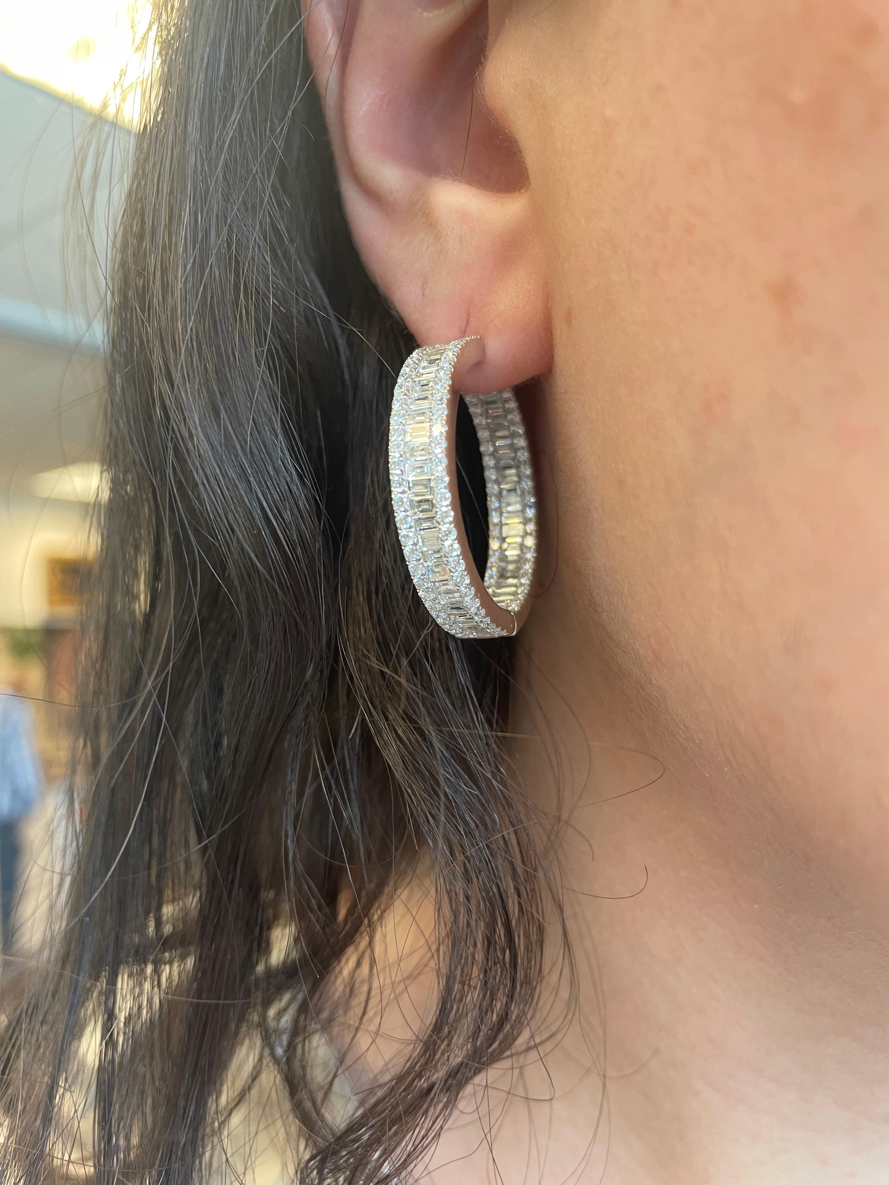 Stunning diamond hoop earrings with baguette diamonds, by Alexander Beverly Hills. 
292 round brilliant  and baguette cut diamonds, 6.33 carats total. Approximately G/H color and VS clarity. 20.24 grams, 18-karat white gold.
Accommodated with an