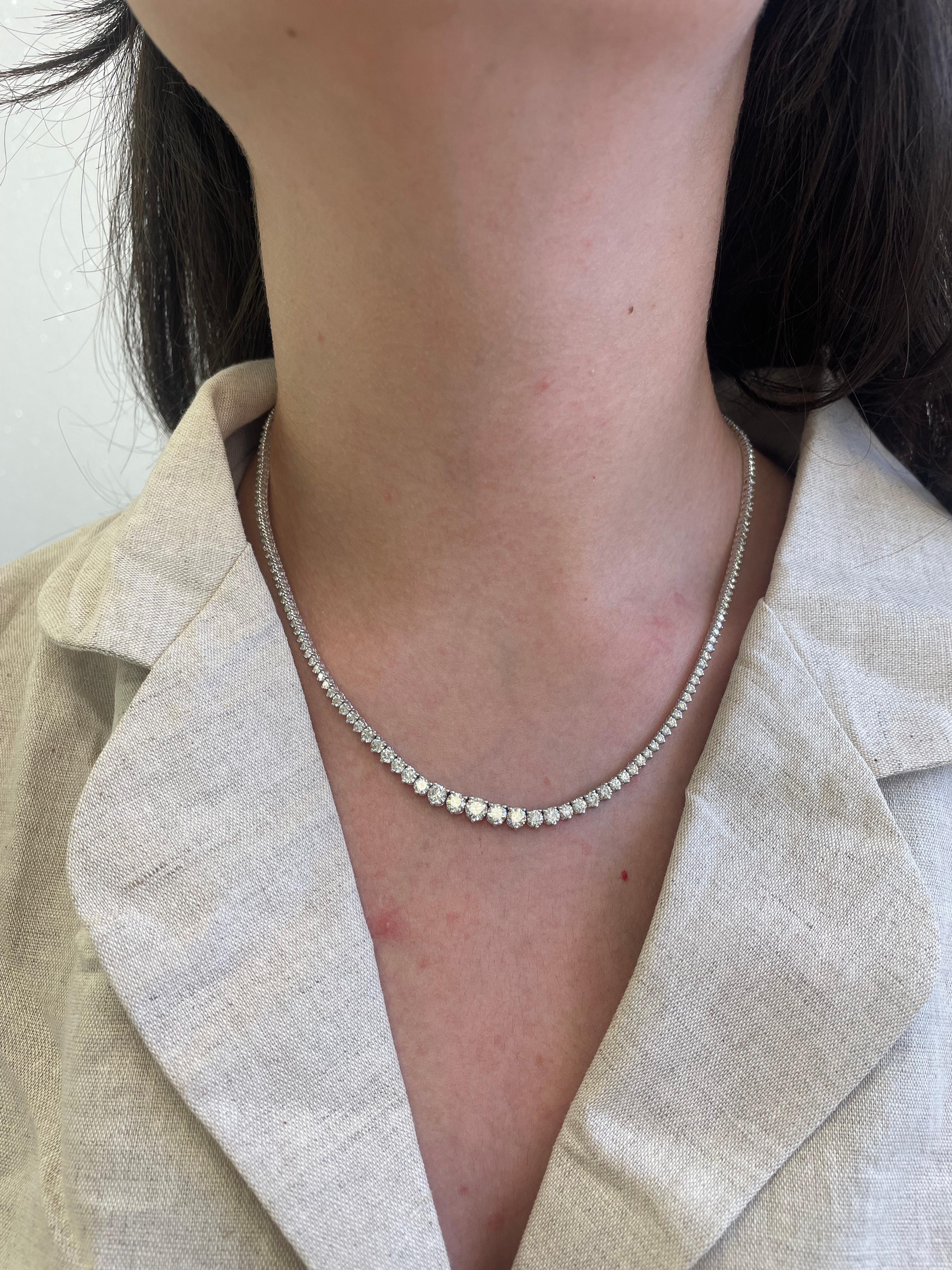Beautiful and classic diamond tennis riviera necklace, by Alexander Beverly Hills.
8.53 carats of round brilliant diamonds, approximately F-H color and VVS2-SI1 clarity. 18k white gold, 14.45 grams, three prong set, 16n.
Accommodated with an
