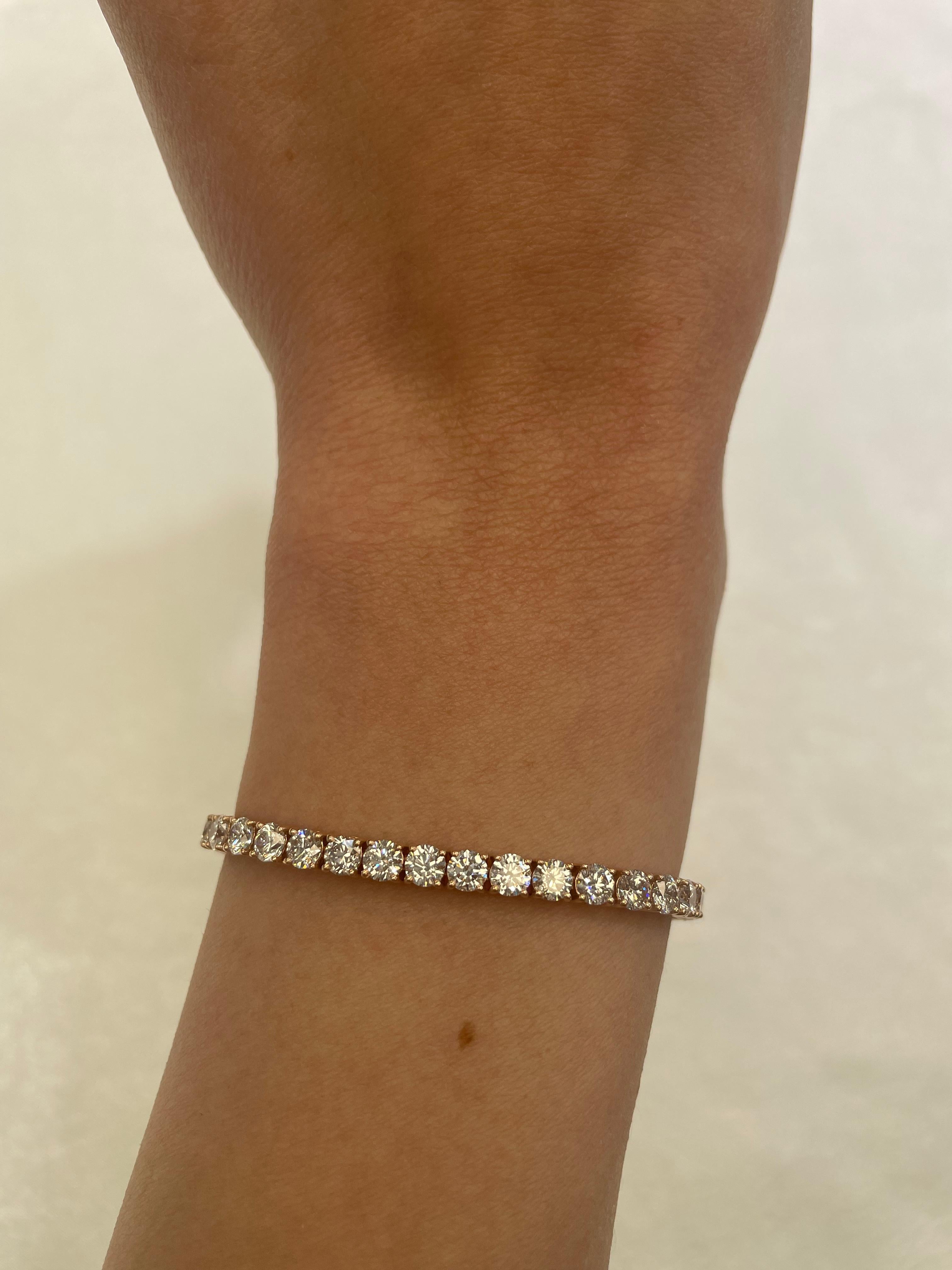 Exquisite and timeless diamonds tennis bracelet, by Alexander Beverly Hills.
47 round brilliant diamonds, 8.69 carats total. Approximately F/G color and VS2/SI1 clarity. Four prong set in 14k rose gold, 10.97 grams, 7 inches. 
Accommodated with an