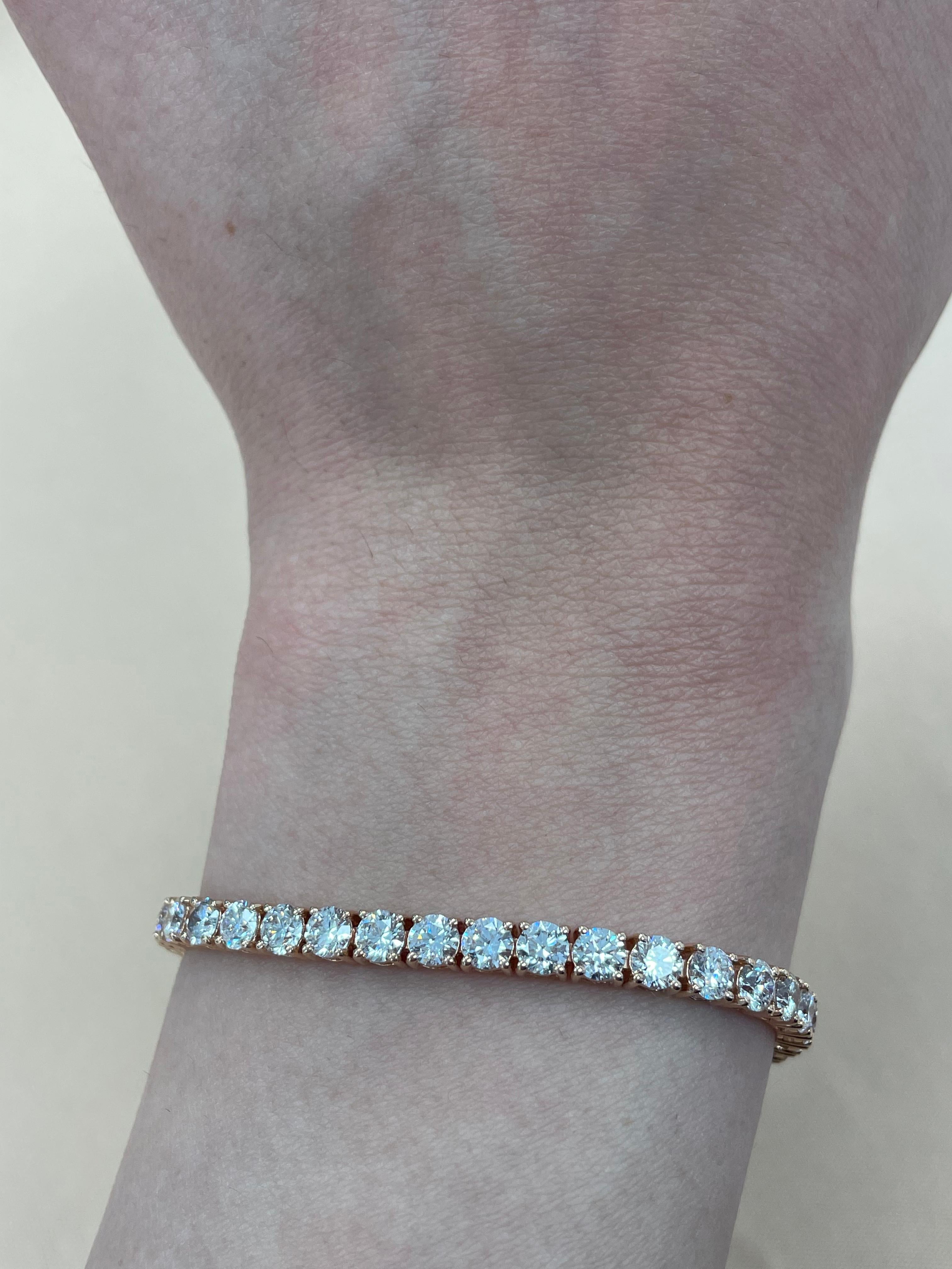 Exquisite and timeless diamonds tennis bracelet, by Alexander Beverly Hills.
45 round brilliant diamonds, 8.80 carats total. Approximately Very Light Pink color (looks like regular white diamonds in mounting) and VS2/SI1 clarity. Four prong set in