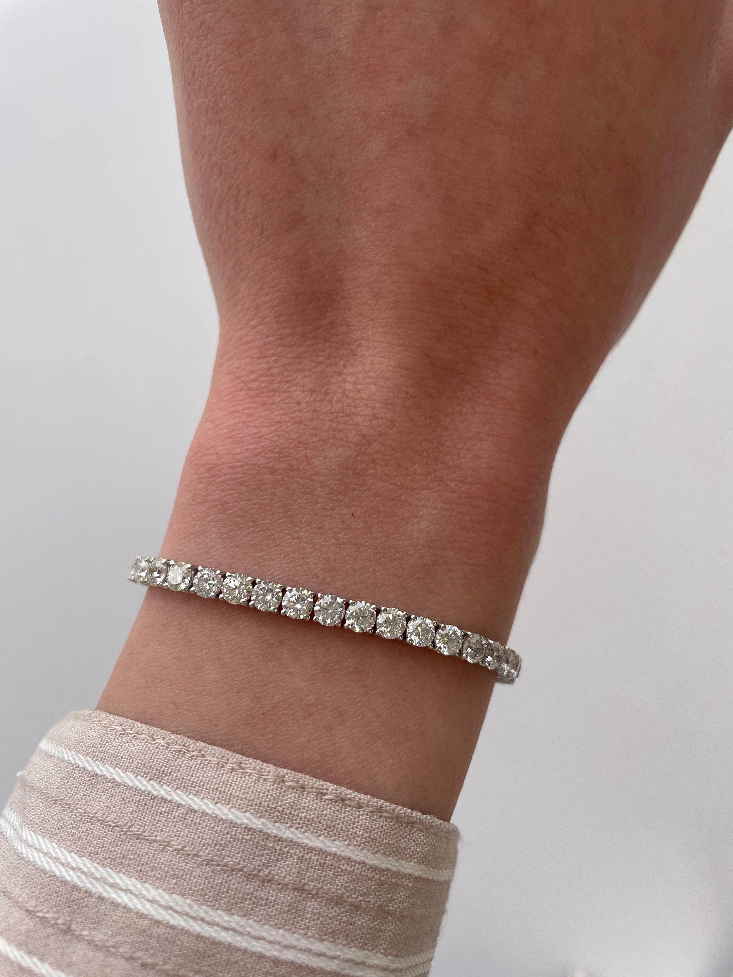 Exquisite and timeless diamonds tennis bracelet, by Alexander Beverly Hills.
48 round brilliant diamonds, 8.80 carats. Approximately D-F color and SI clarity. Four prong set in 18k white gold, 9.76 grams, 7 inches. 
Accommodated with an up-to-date
