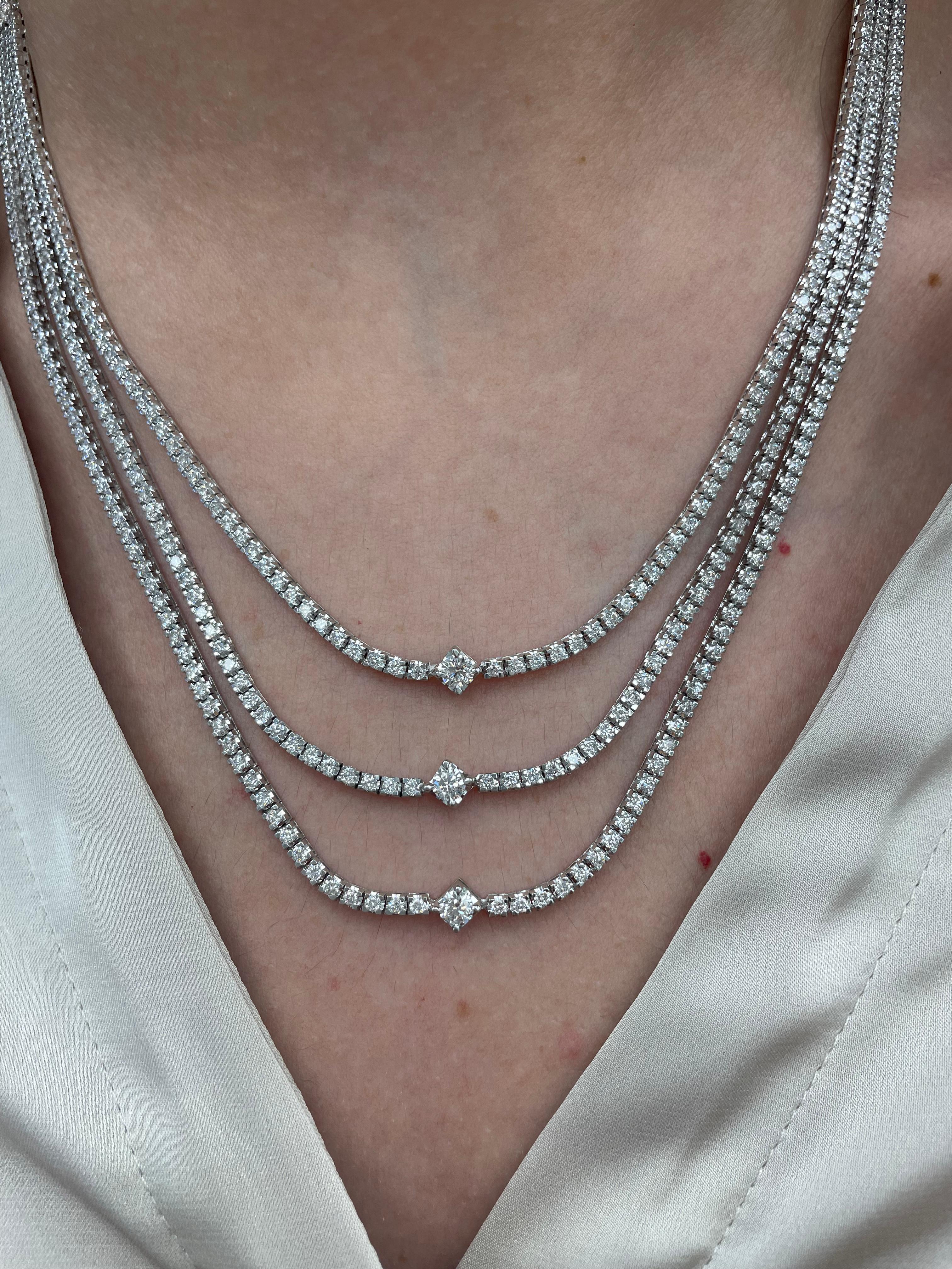 Sensational 3 row diamond tennis necklace. High jewelry by Alexander of Beverly Hills.
9.02 carats total. 
3 larger round brilliant diamonds, 0.72 carats. Along with 443 round brilliant diamonds, 8.30 carats. Approximately D-F color and VS2/SI1
