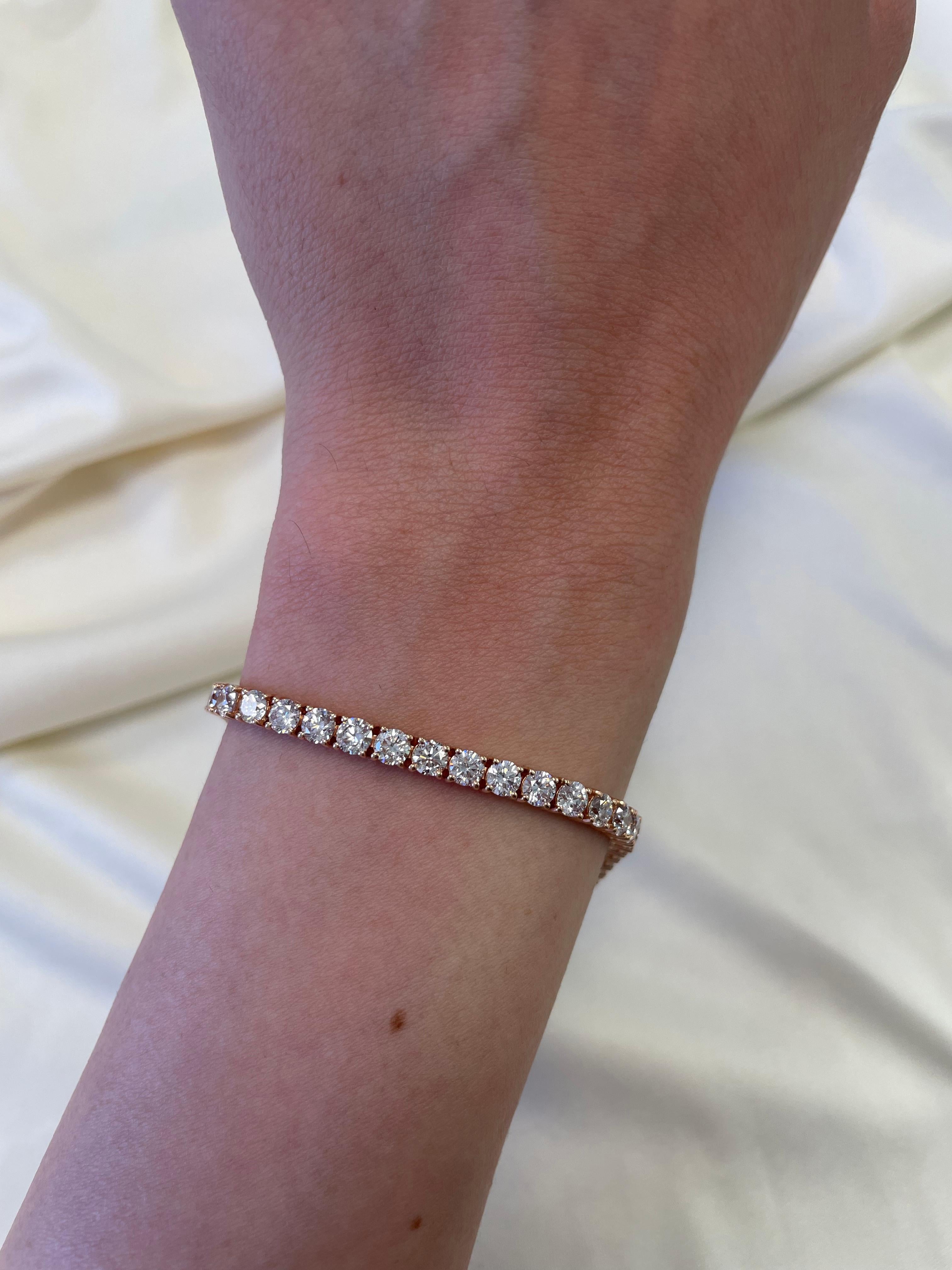 Exquisite and timeless diamonds tennis bracelet, by Alexander Beverly Hills.
45 round brilliant diamonds, 9.10 carats total. Approximately F/G color and VS2/SI1 clarity. Four prong set in 14k rose gold, 11.74 grams, 7 inches. 
Accommodated with an