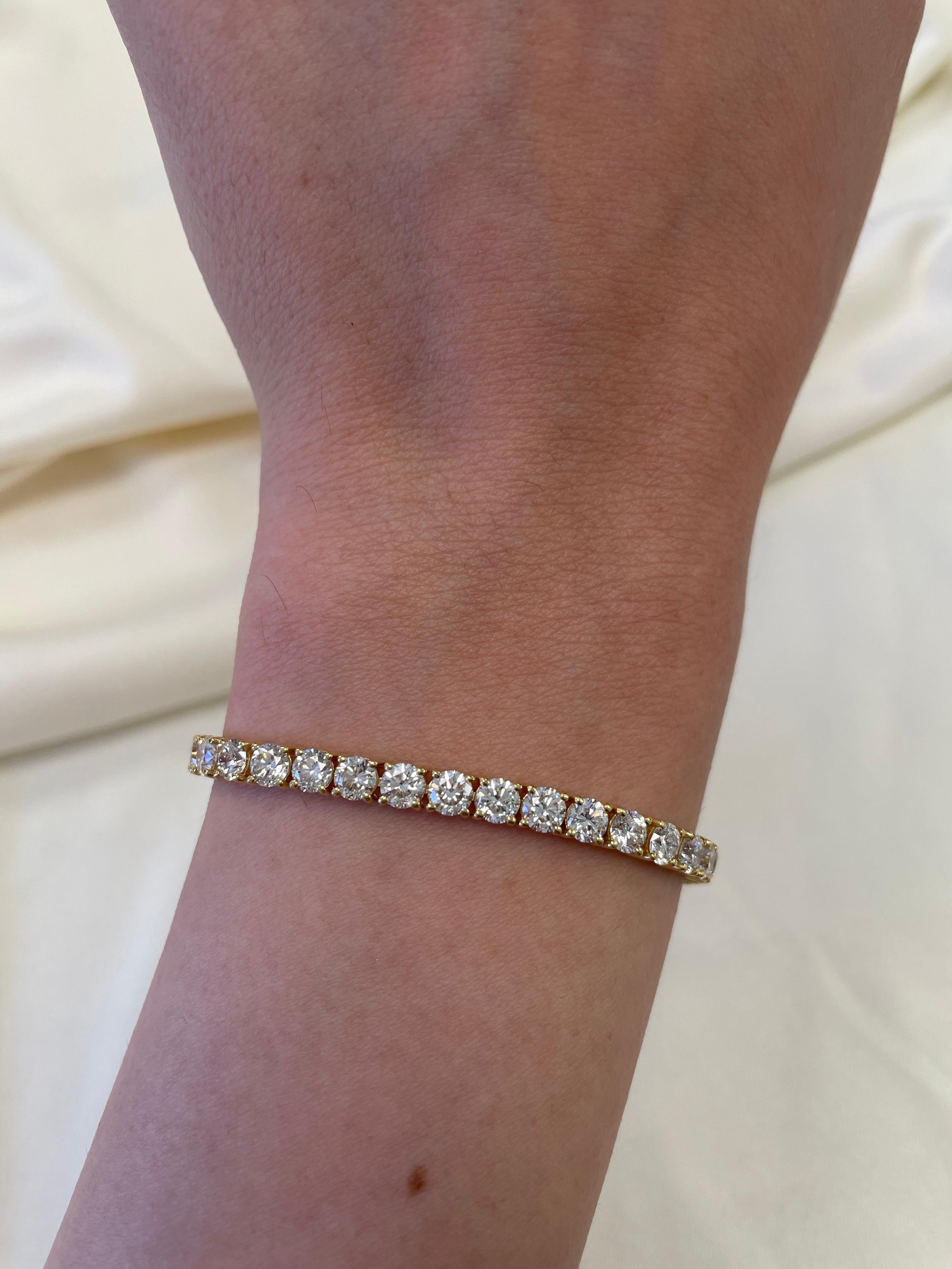 Exquisite and timeless diamonds tennis bracelet, by Alexander Beverly Hills.
45 round brilliant diamonds, 9.52 carats total. Approximately G/H color and VS clarity. Four prong set in 18k yellow gold, 11.30 grams, 7 inches. 
Accommodated with an