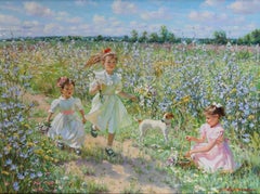 Young Girls Playing in a Wild Flower Meadow with a Jack Russell