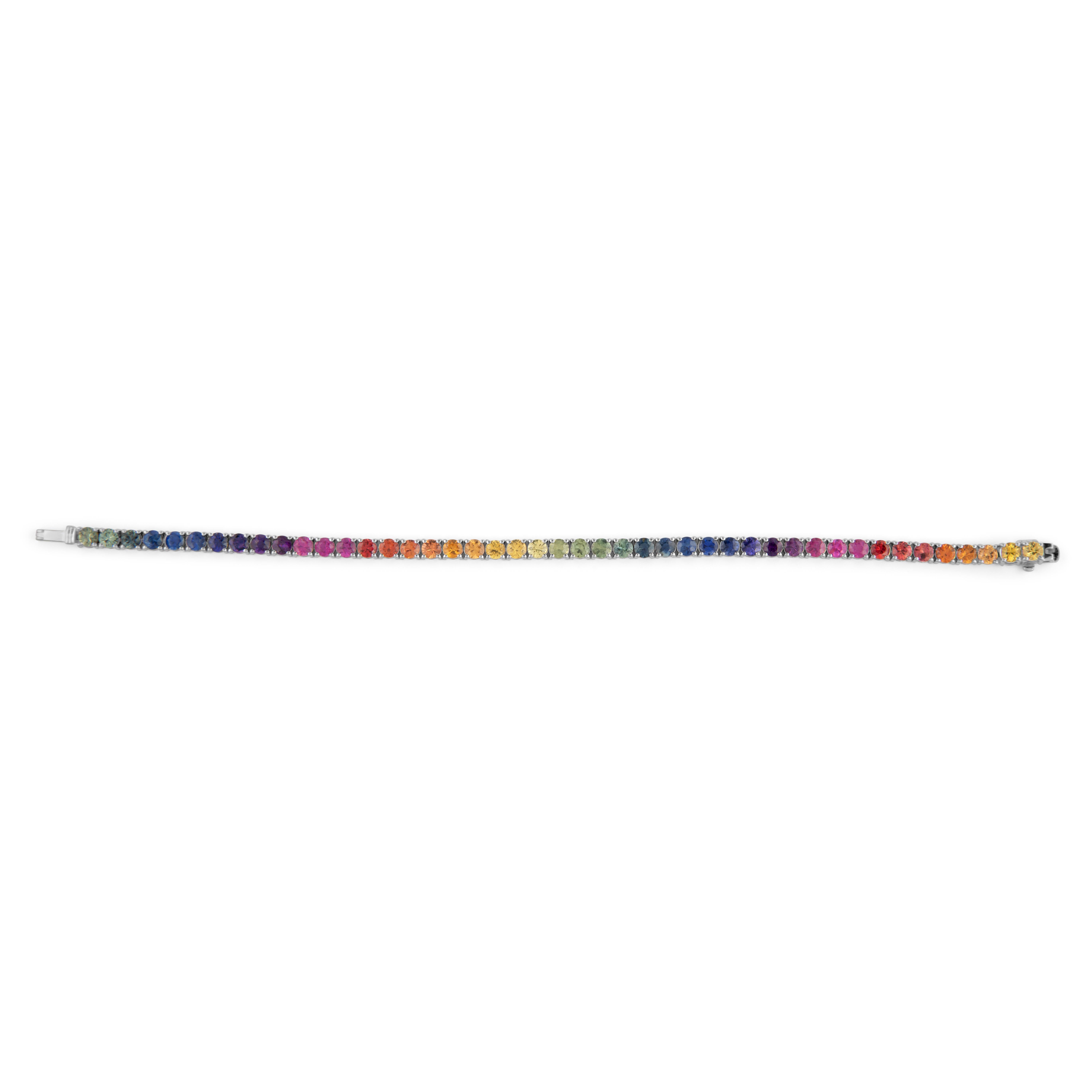 Exquisite and perfectly graduated rainbow multi color sapphire tennis bracelet, by Alexander Beverly Hills.
45 round sapphires, 10.23 carats total. Four prong set in 18k white gold, 9.69 grams, 7 inches.
Accommodated with an up-to-date digital