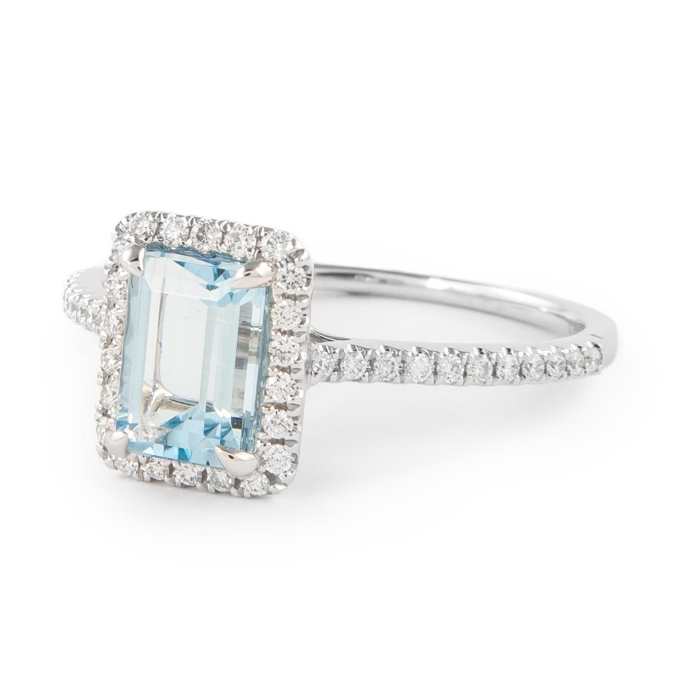Stunning natural aquamarine and natural diamond ring with halo, by Alexander Beverly Hills.
1.07 carats total gemstone weight.
1 emerald cut aquamarine, 0.88 carats. Complimented by 44 round brilliant diamonds, 0.19 carats. Approximately F/G color