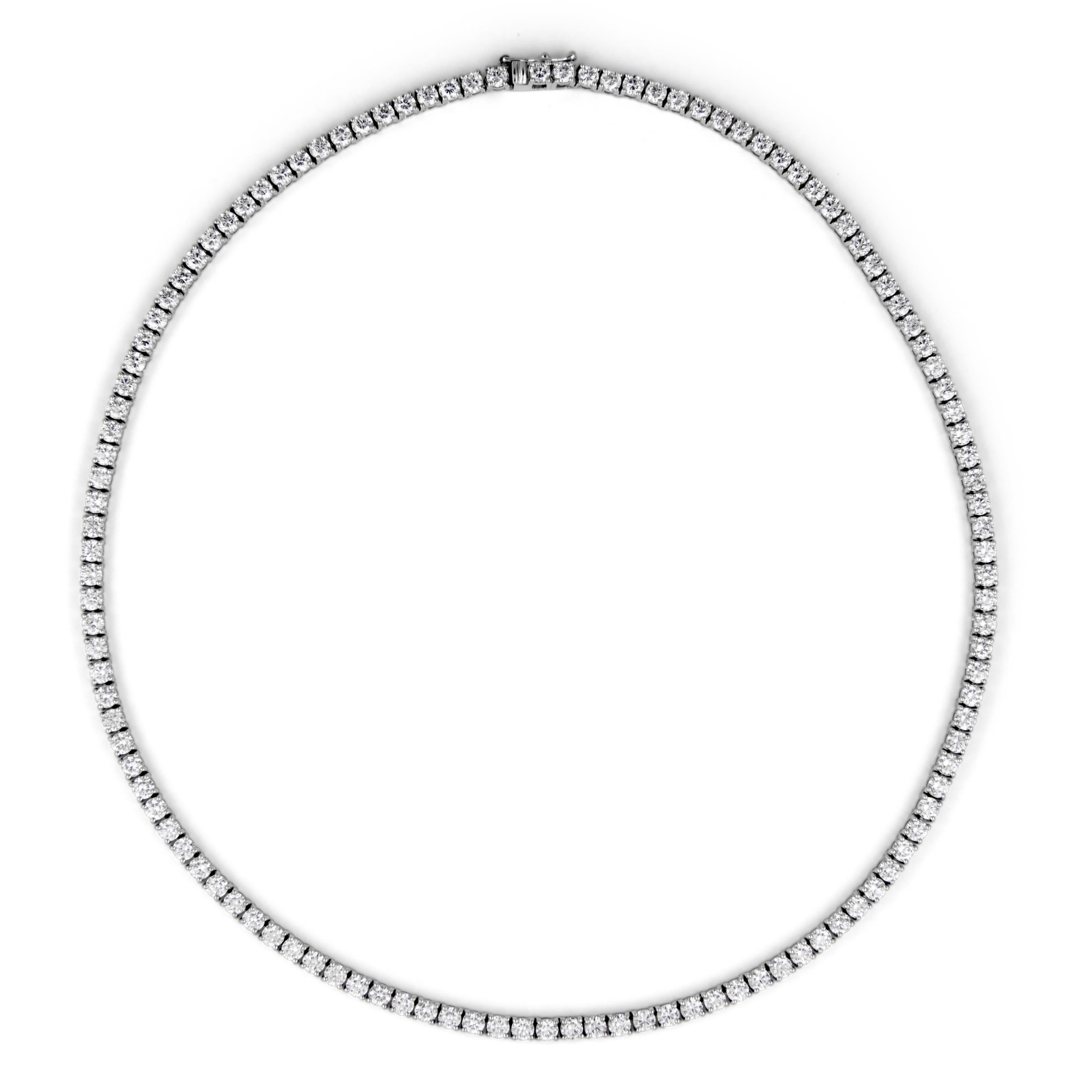 Beautiful and classic diamond tennis necklace. Created by Alexander Beverly Hills.
93 round brilliant diamonds, 11.20 carats. Approximately D color and VS2 clarity. 18-karat white gold, 22.29 grams, 15.5 inches.
Accommodated with an up-to-date
