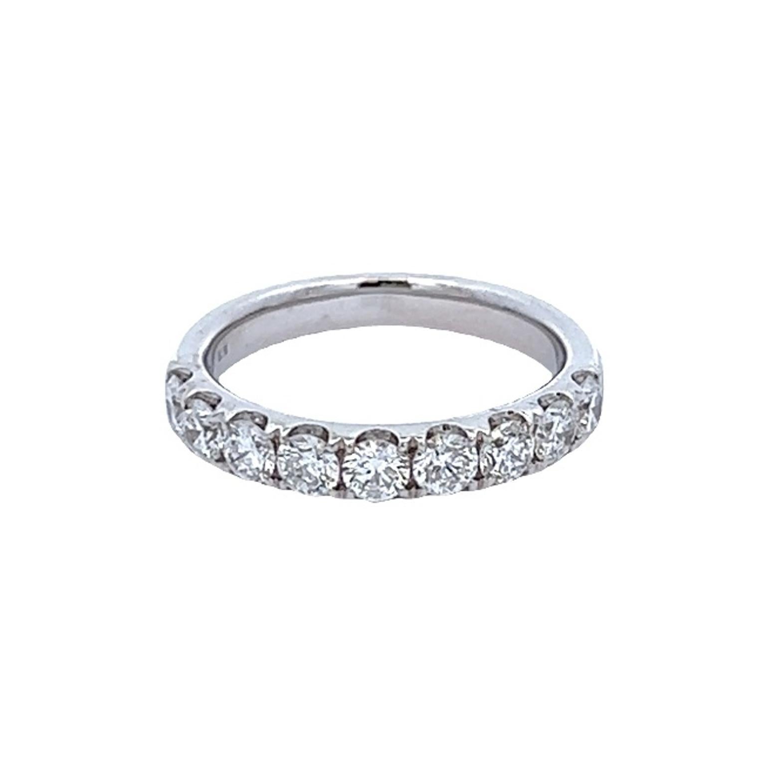 Timeless diamond half eternity band. By Alexander Beverly Hills.
9 round brilliant diamonds, 1.12 carats. Approximately F/G color and SI2 clarity. Set in 18k white gold, 4.58 grams, size 6.25.
Accommodated with an up-to-date appraisal by a GIA G.G.
