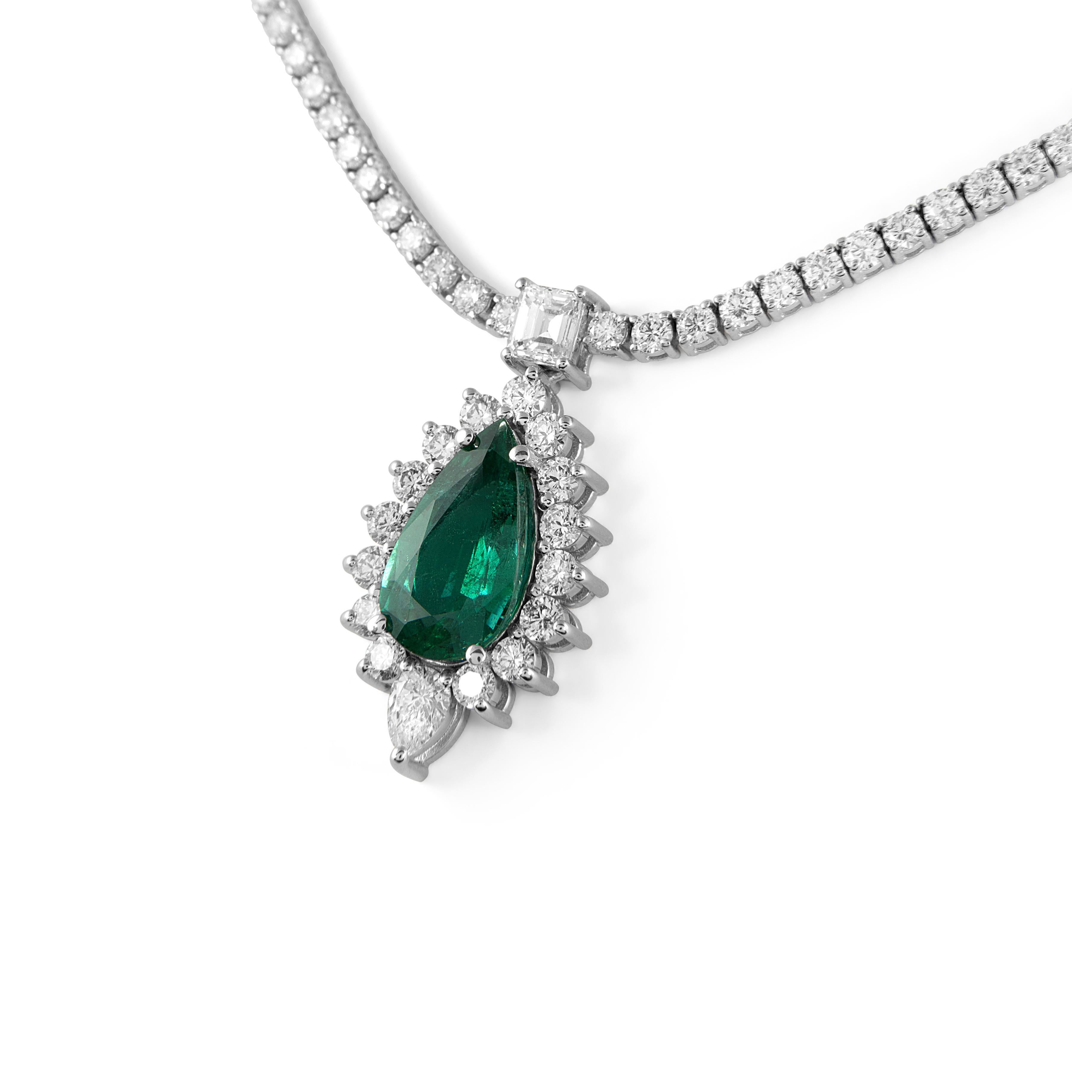 Beautiful emerald drop pendant and diamond tennis necklace. High jewelry Alexander Beverly Hills.
13.38 carats total gemstone weight.
3.31 carat pear shape emerald, apx F1/F2. 10.07 carats of round, emerald cut and pear shape diamonds. Approximately