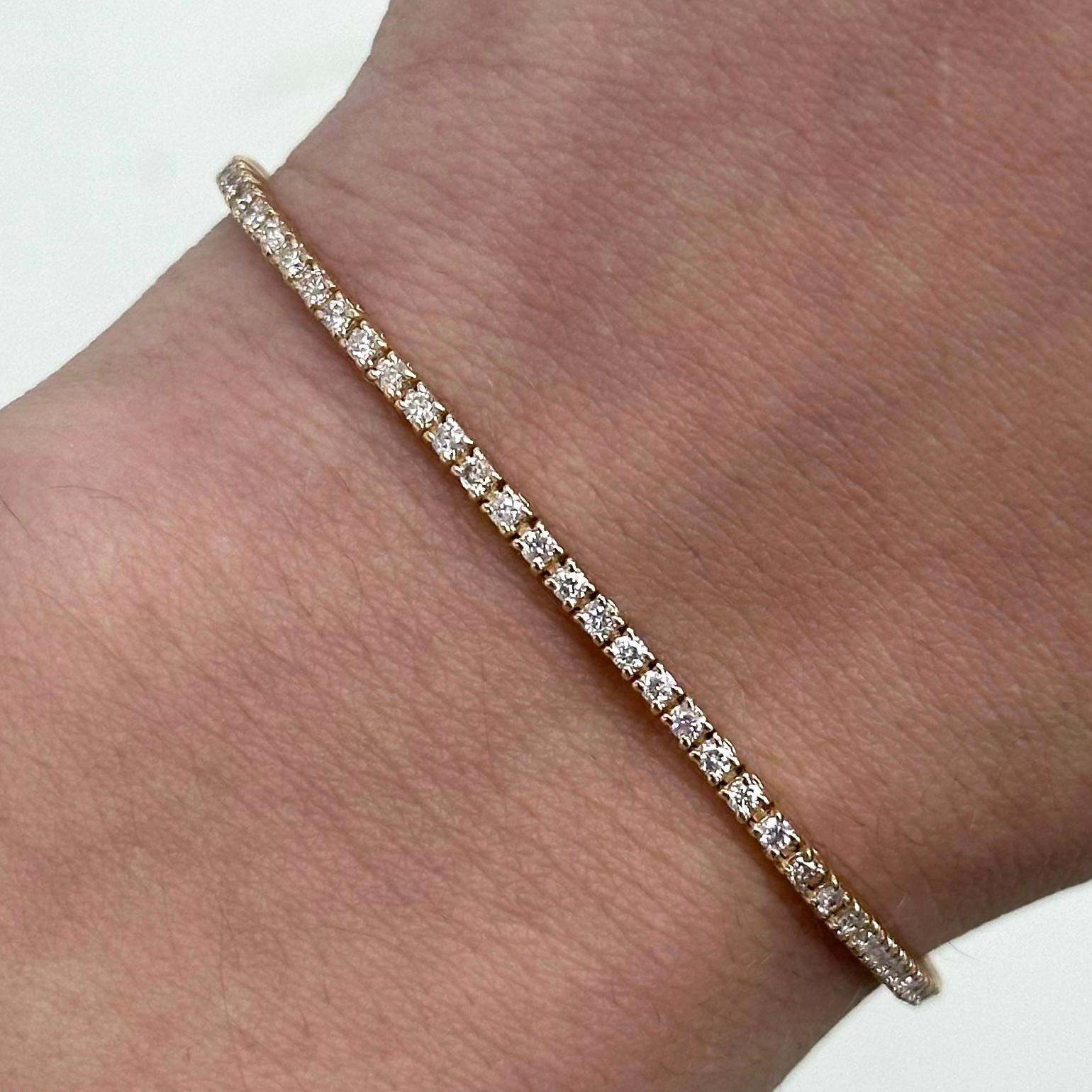 Exquisite and timeless diamonds tennis bracelet, by Alexander Beverly Hills.
90 round brilliant diamonds, 1.35 carats total. Approximately G/H color and SI clarity. Four prong set in 14k rose gold, 5.32 grams, 7 inches. 
Accommodated with an
