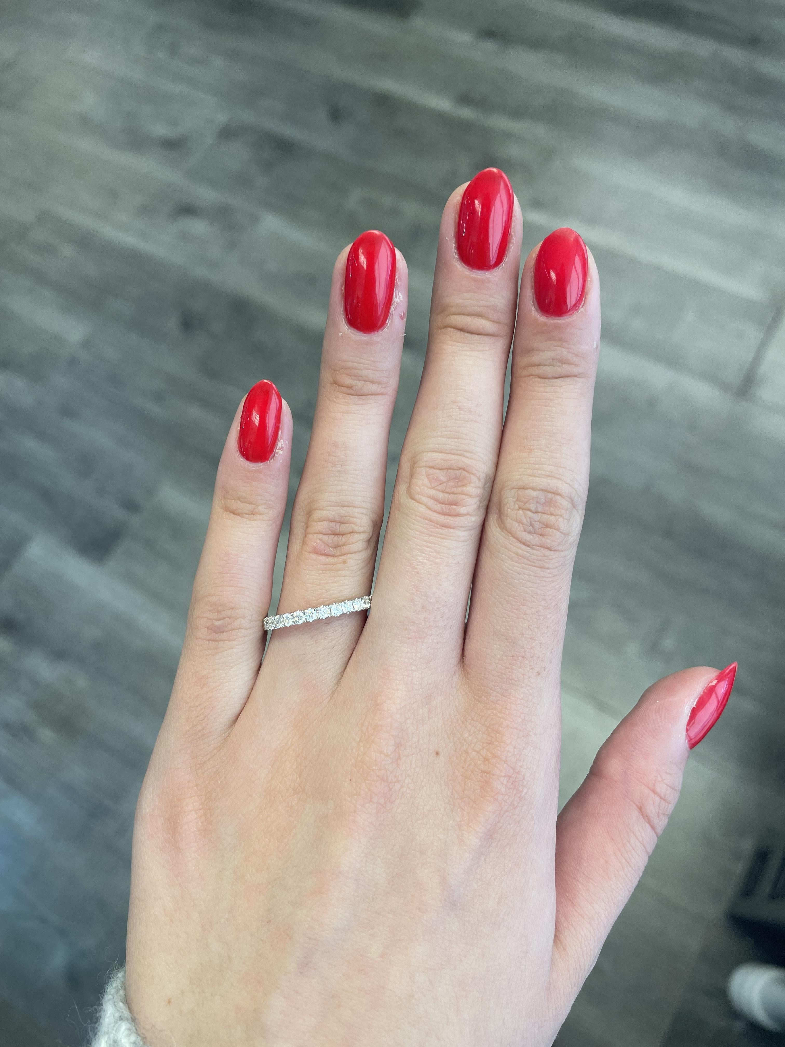 Timeless diamond eternity band. By Alexander Beverly Hills.
31 round brilliant diamonds, 1.37 carats. Approximately H/I color and SI clarity. Set in 18k white gold, size 8. 
Accommodated with an up-to-date appraisal by a GIA G.G. once purchased,