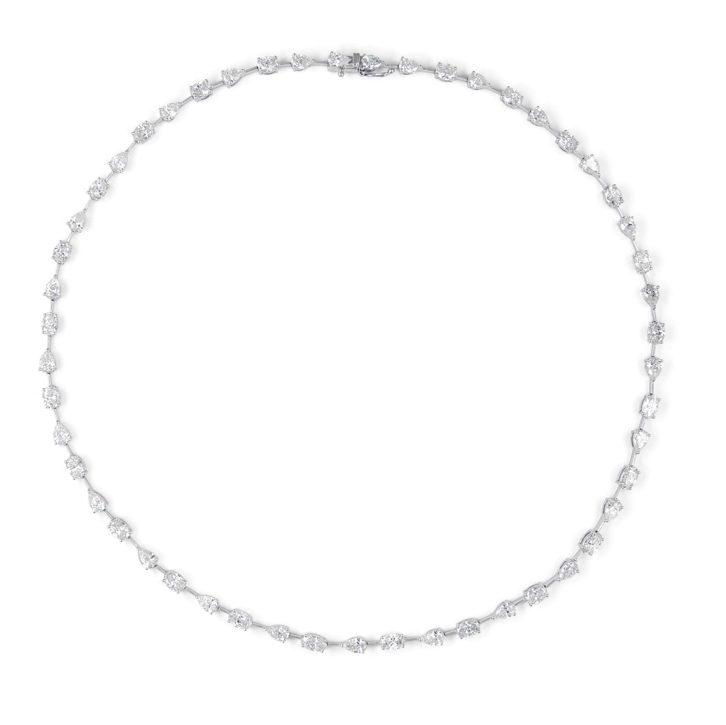 Beautiful and modern alternating pear and oval natural diamond necklace. High jewelry by Alexander Beverly Hills.
13.92 carats total diamond weight.
24 oval brilliant diamonds, 7.42 carats. 27 pear brilliant diamonds, 6.50 carats.
Approximately F/G