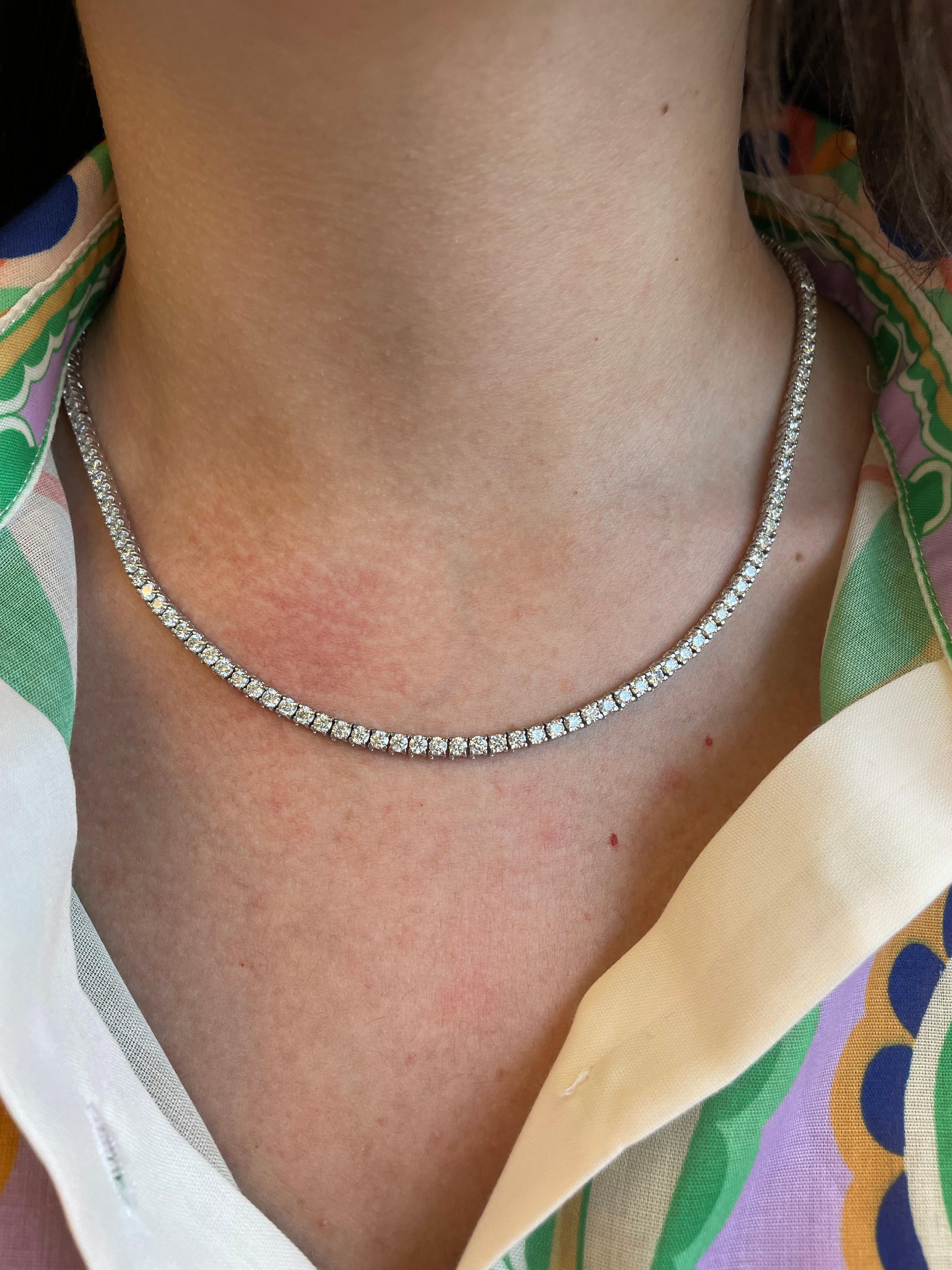 Beautiful and classic natural diamond tennis necklace. By Alexander Beverly Hills.
123 round brilliant diamonds, 14.59 carats. Approximately D-F color and VVS1/VVS2 clarity. 18k white gold, 23.79 grams, 17in.
Accommodated with an up-to-date digital