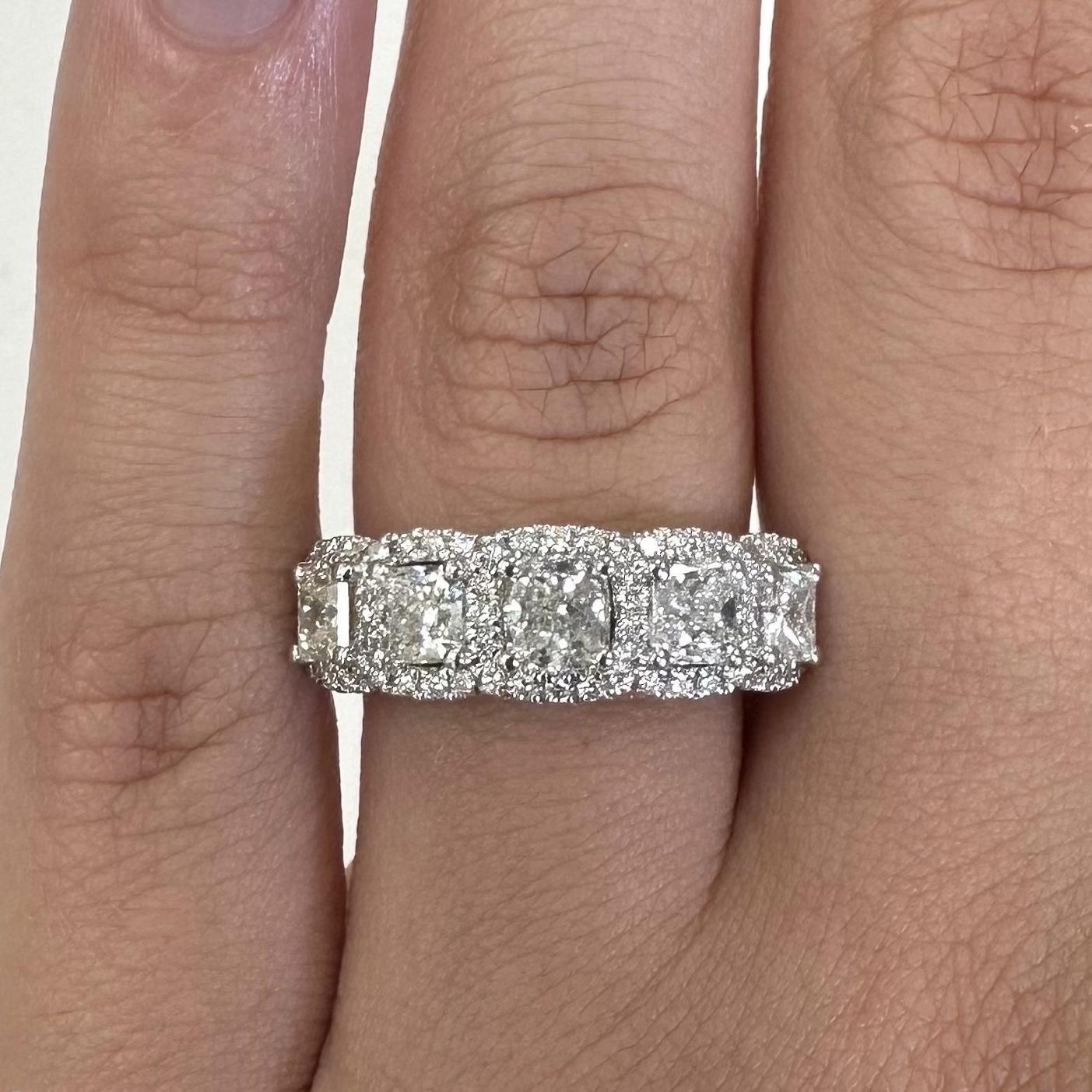 Stunning cushion cut diamond eternity band, By Alexander Beverly Hills.
1.64 carats total diamond weight. 
5 cushion cut diamonds, 1.41 carats. F/G color and SI clarity. Complimented with 60 round diamonds, 0.23 carats. Approximately E/F color and