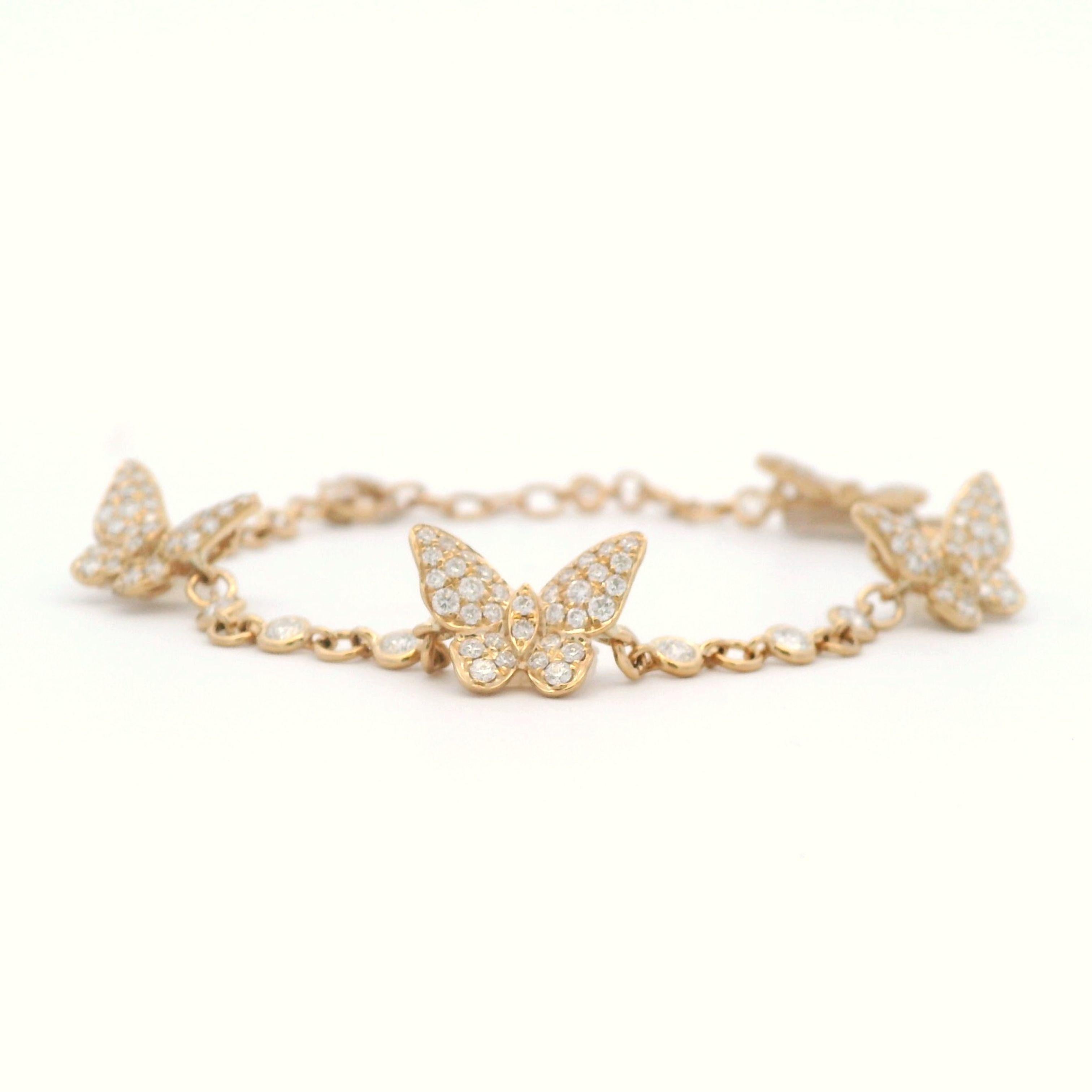 Beautiful petit butterfly bracelet, by Alexander Beverly Hills.
194 round diamonds, 1.65 carats total. Approximately F/G color and VS clarity. Prong set in 18k yellow gold, 7.63 grams, 6.5-7 inches.
Accommodated with an up-to-date digital appraisal