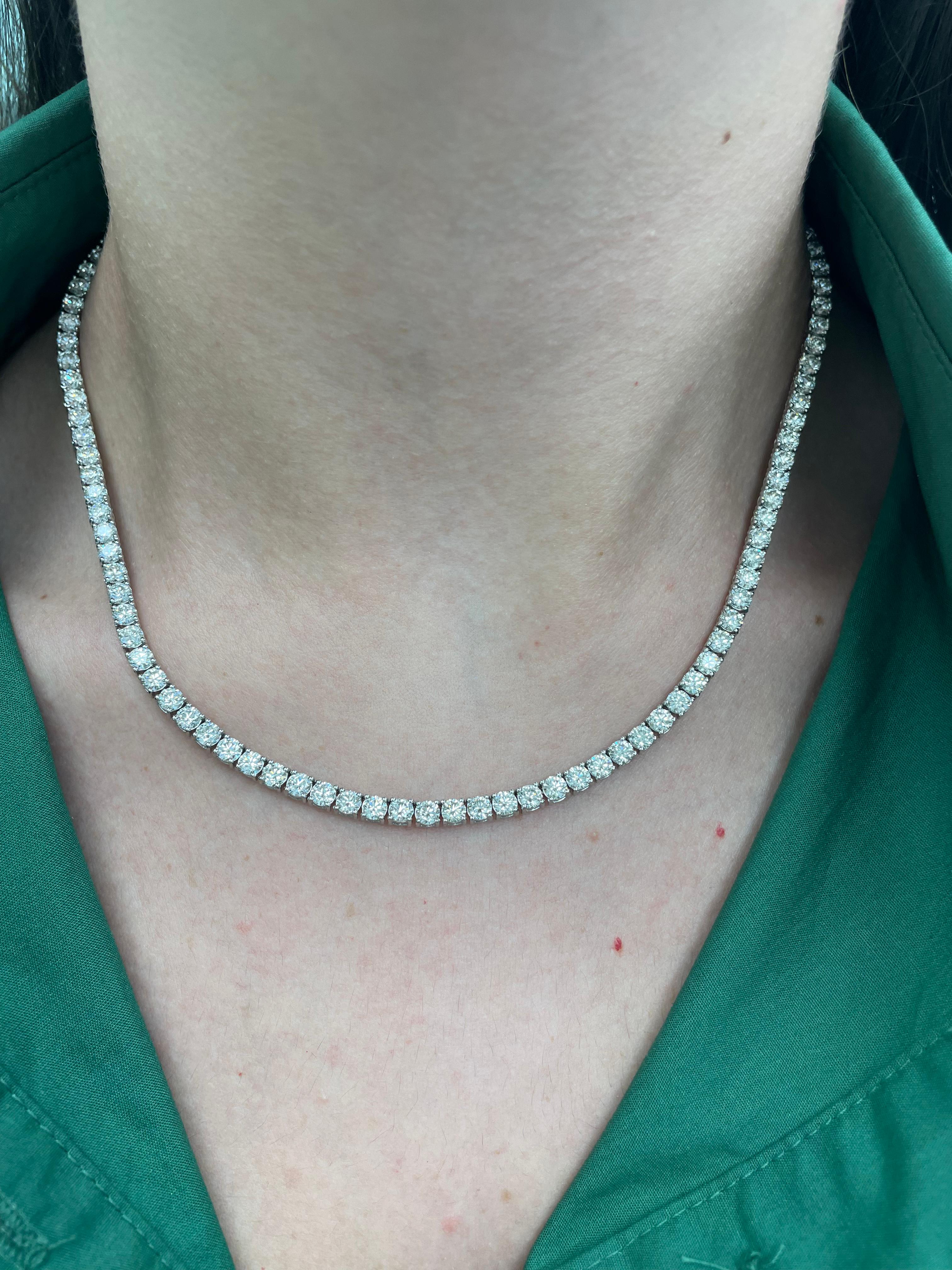 Beautiful and classic diamond tennis necklace, by Alexander Beverly Hills.
109 round brilliant diamonds, 16.90 carats. Approximately H/I color and VS clarity. 18-karat white gold, 34.65 grams, prong set, 16in.
Accommodated with an up-to-date digital