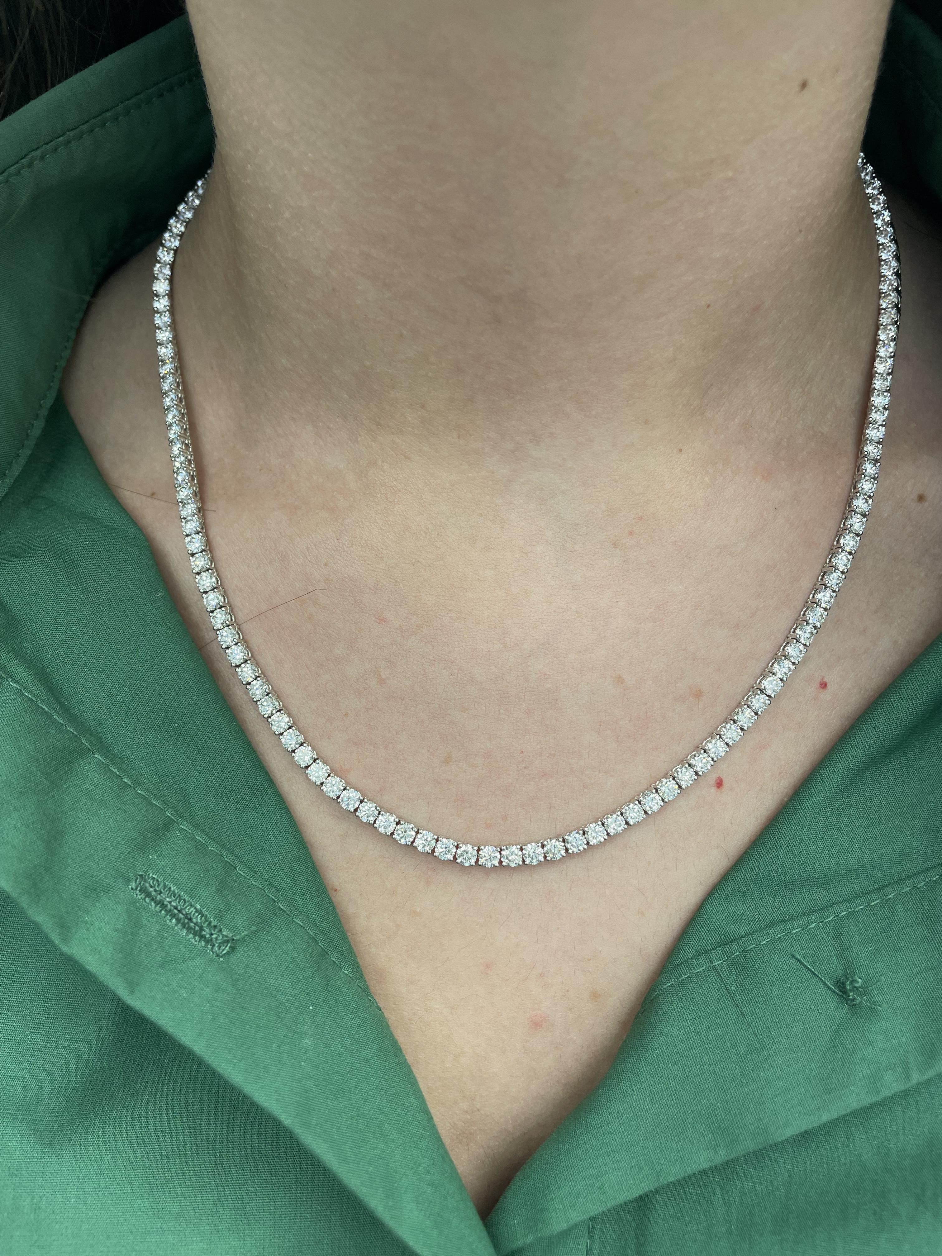 Beautiful and classic diamond tennis necklace. Created by Alexander Beverly Hills.
137 round brilliant diamonds, 17.35 carats. Approximately G/H color and VS1 clarity. 18-karat white gold, 23.96 grams, 18.5 inches.
Accommodated with an up-to-date