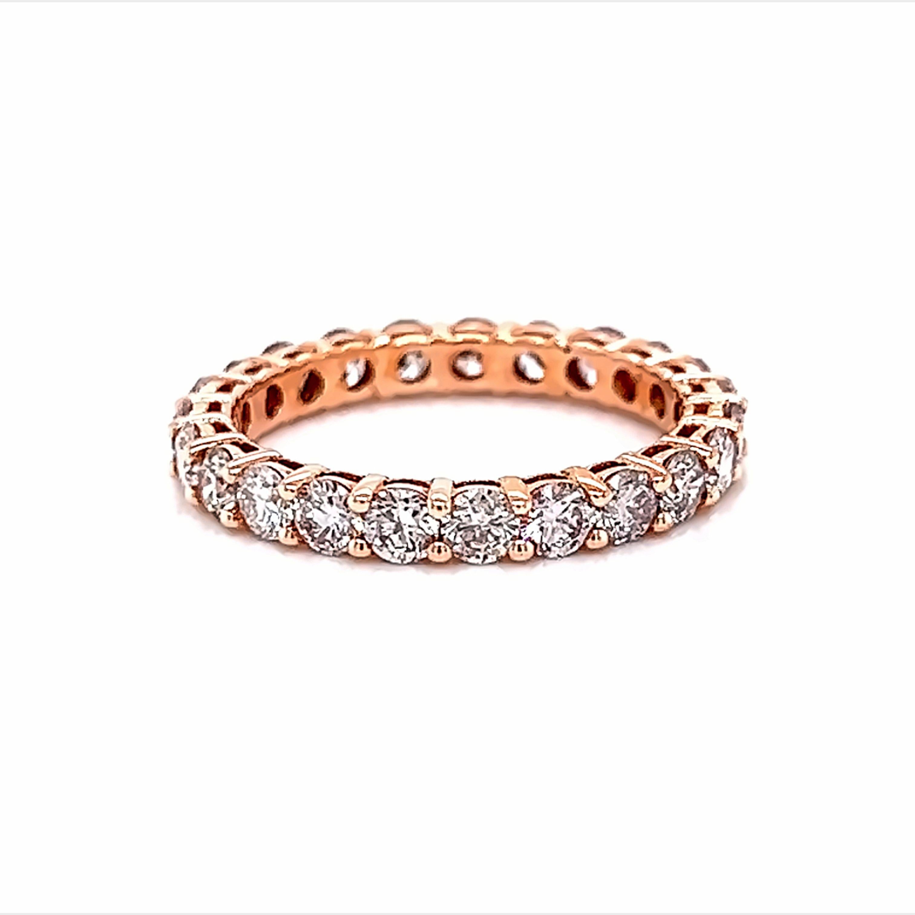 Timeless diamond eternity band. By Alexander Beverly Hills.
23 round brilliant diamonds, 1.82 carats. Approximately G/H color and SI clarity. Set in 14k rose gold, 1.98 grams, size 5.75. 
Accommodated with an up-to-date appraisal by a GIA G.G. once
