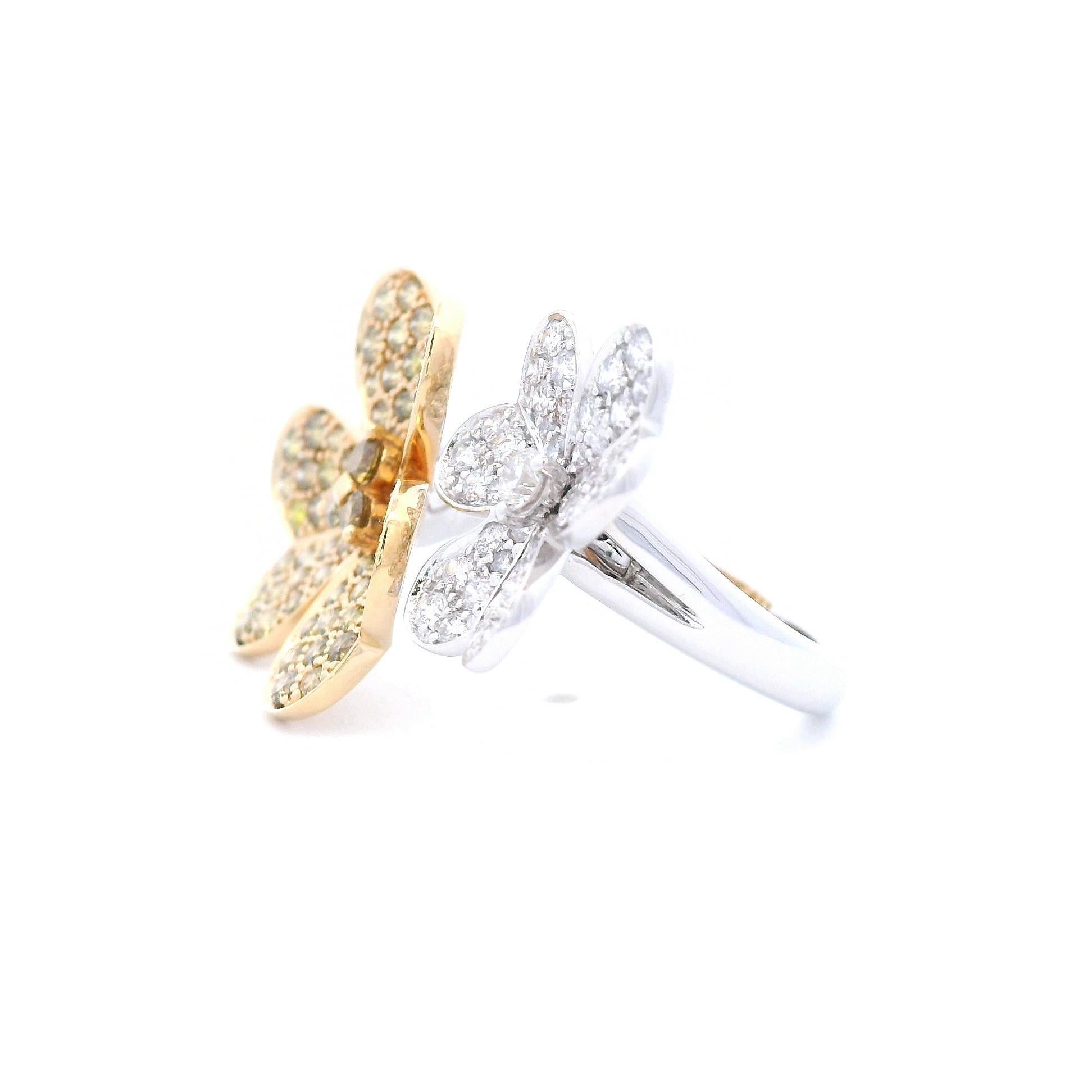Schöner floraler Ring mit gelben und weißen Naturdiamanten von Alexander Beverly Hills.
1,82 Karat Gesamtgewicht der Diamanten.
77 runde gelbe Diamanten, 1,29 Karat. Ungefähr grünlich-bräunlich-gelbe Diamanten der Farbe Fancy, Reinheit SI. 35 runde
