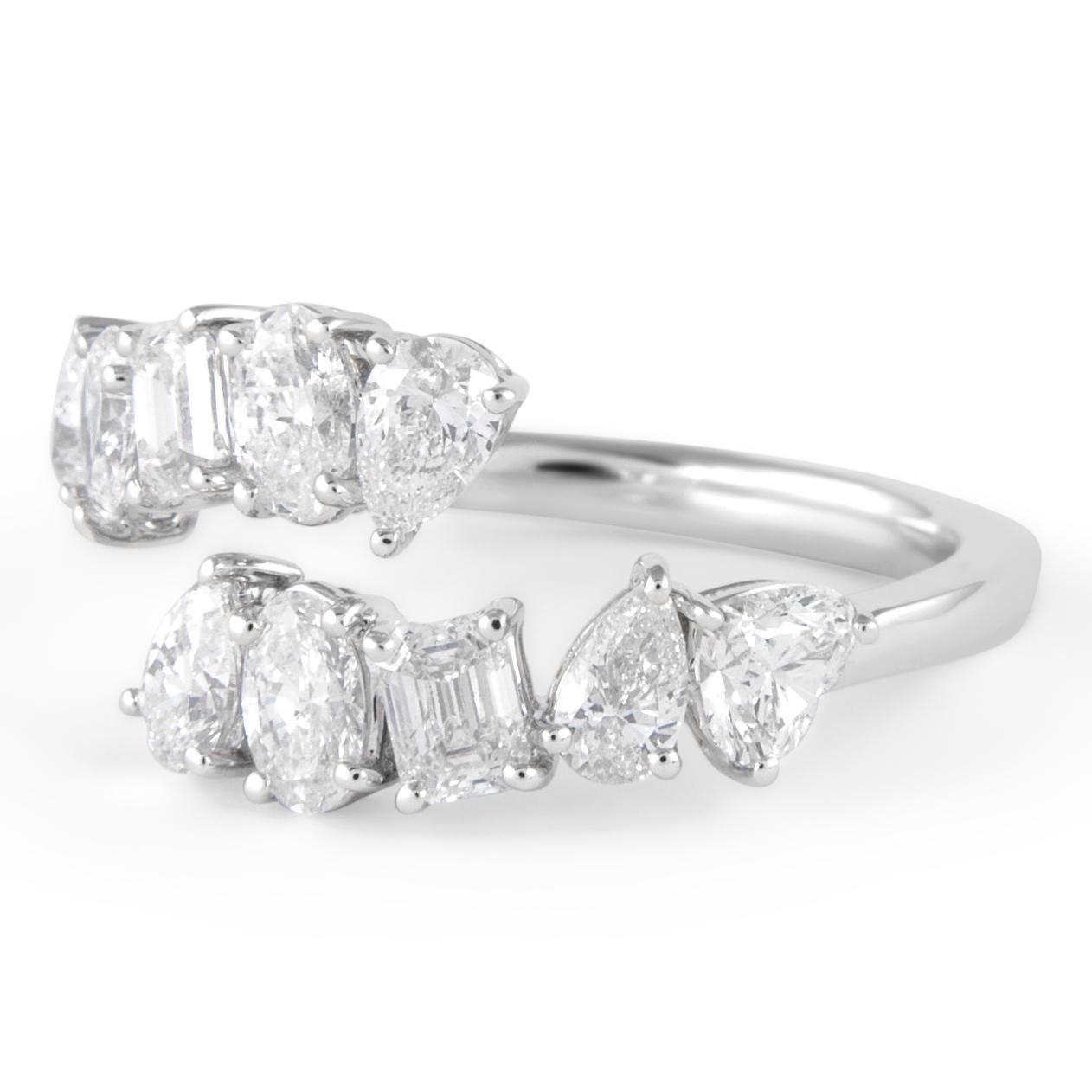 Stunning modern multi diamond bypass ring, by Alexander Beverly Hills.
1.92 carats total
4 pear shape diamonds, 0.64 carats. Approximately D-E color grade and VS clarity grade. 2 heart shape diamonds, 0.46 carats. Approximately D-F color VS clarity.