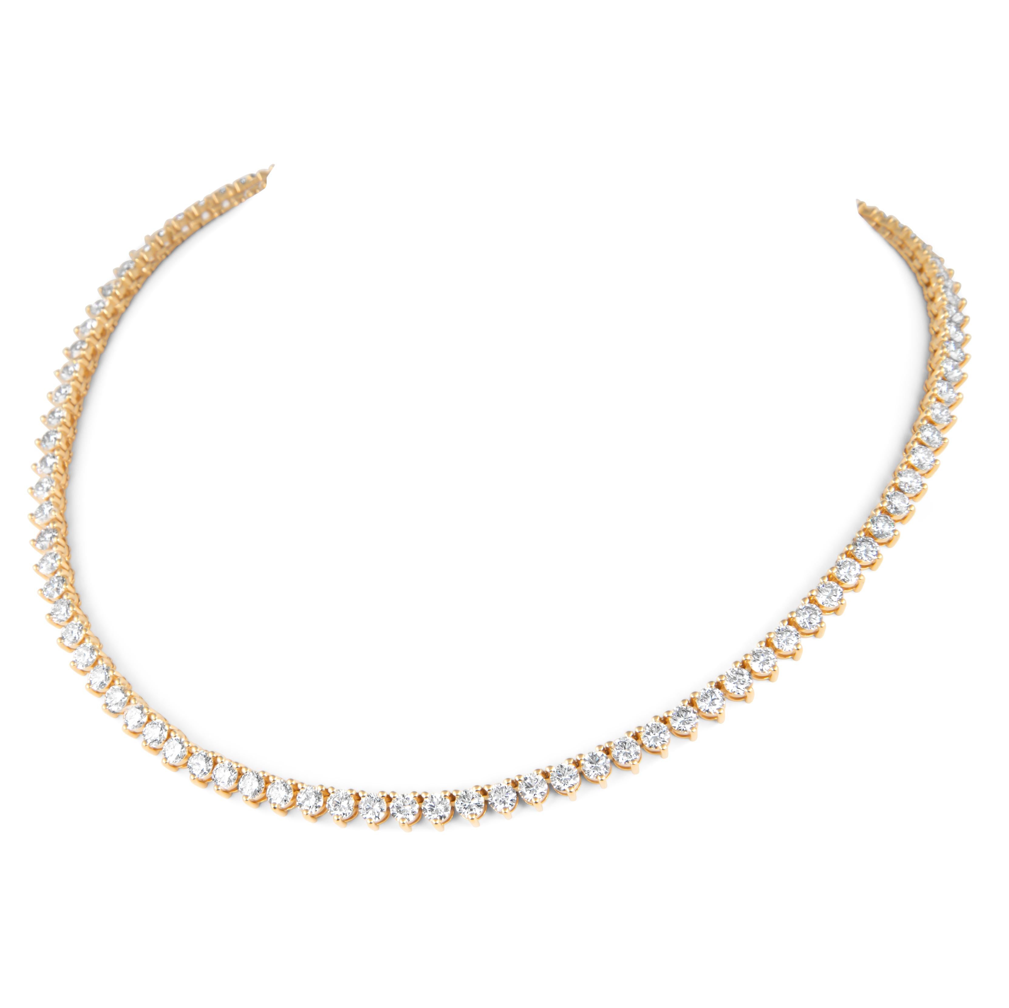 Beautiful and classic three prong yellow gold diamond tennis necklace, by Alexander Beverly Hills.
98 round brilliant diamonds, 19.42 carats. Approximately H/I color and VS clarity. 18k yellow gold, 37.74 grams, 16in.
Accommodated with an up-to-date