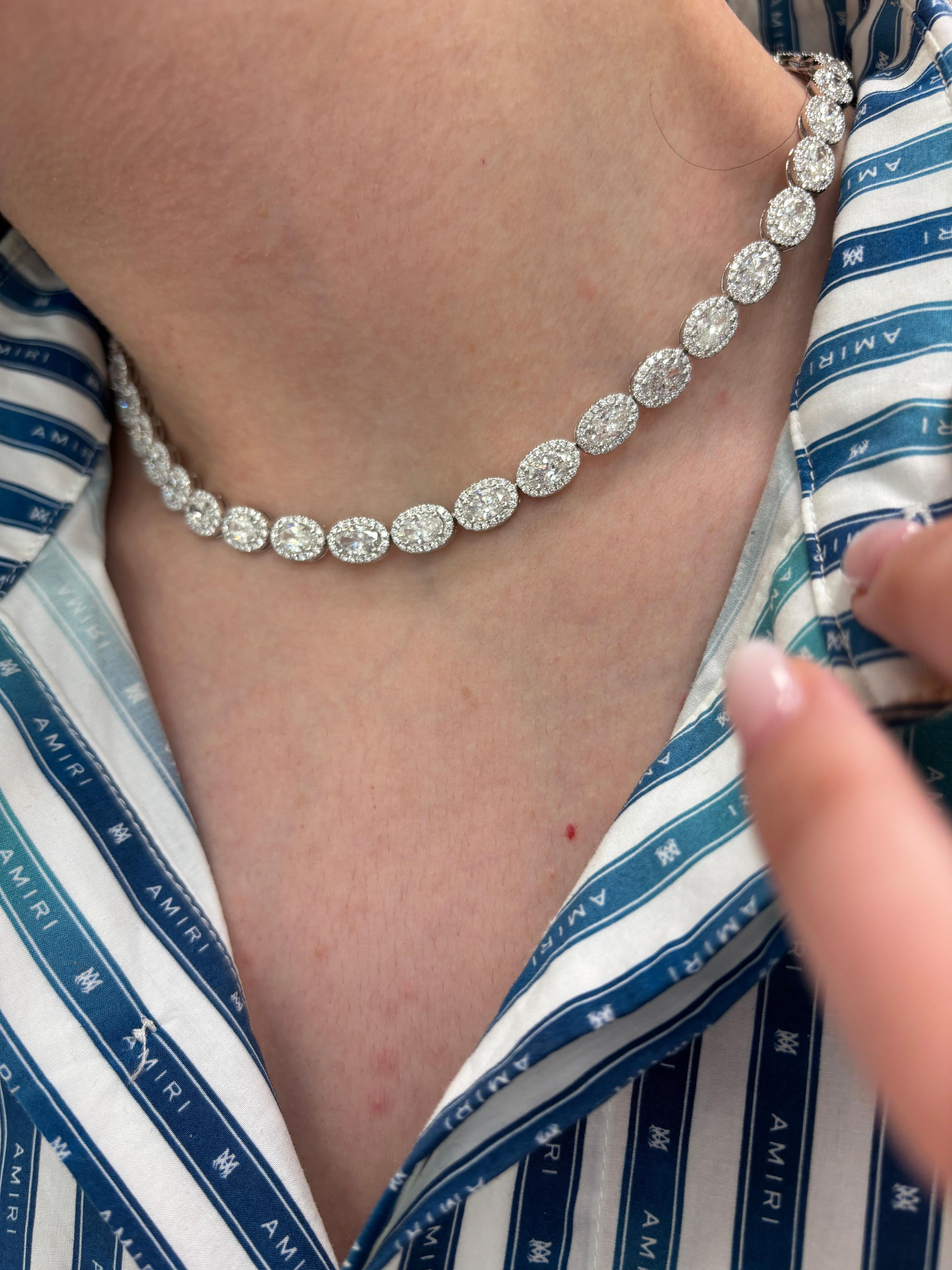 Stunning  oval diamond tennis necklace east-west. High jewelry by Alexander Beverly Hills.
22.18 carats total diamond weight.
45 oval diamonds, 18.55 carats total. Approximately F/G color and SI1 clarity. Complimented with 730 round brilliant