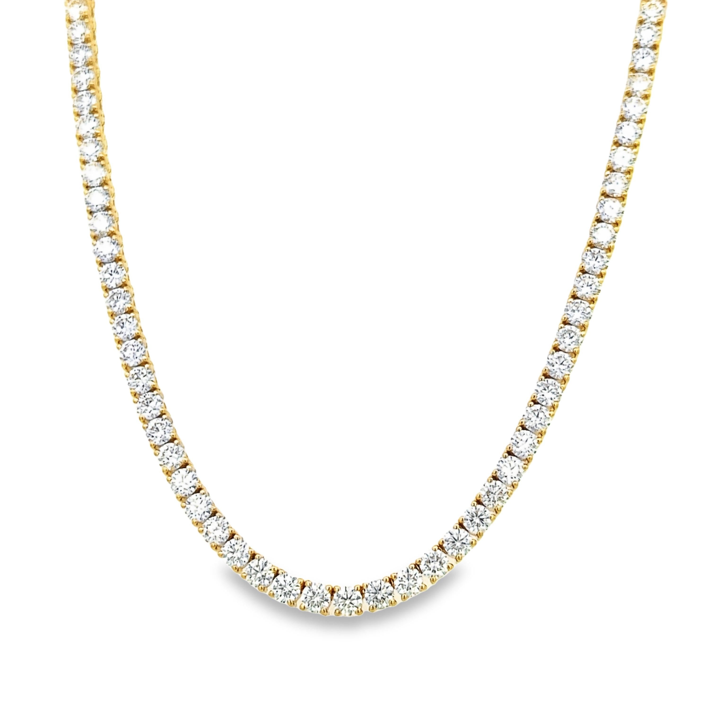 Beautiful and classic diamond tennis riviera necklace, by Alexander Beverly Hills.
125 round brilliant diamonds, 22.77 carats. Approximately H color and VS clarity. 18k yellow gold, 33.47 grams, 18.25in.
Accommodated with an up-to-date digital