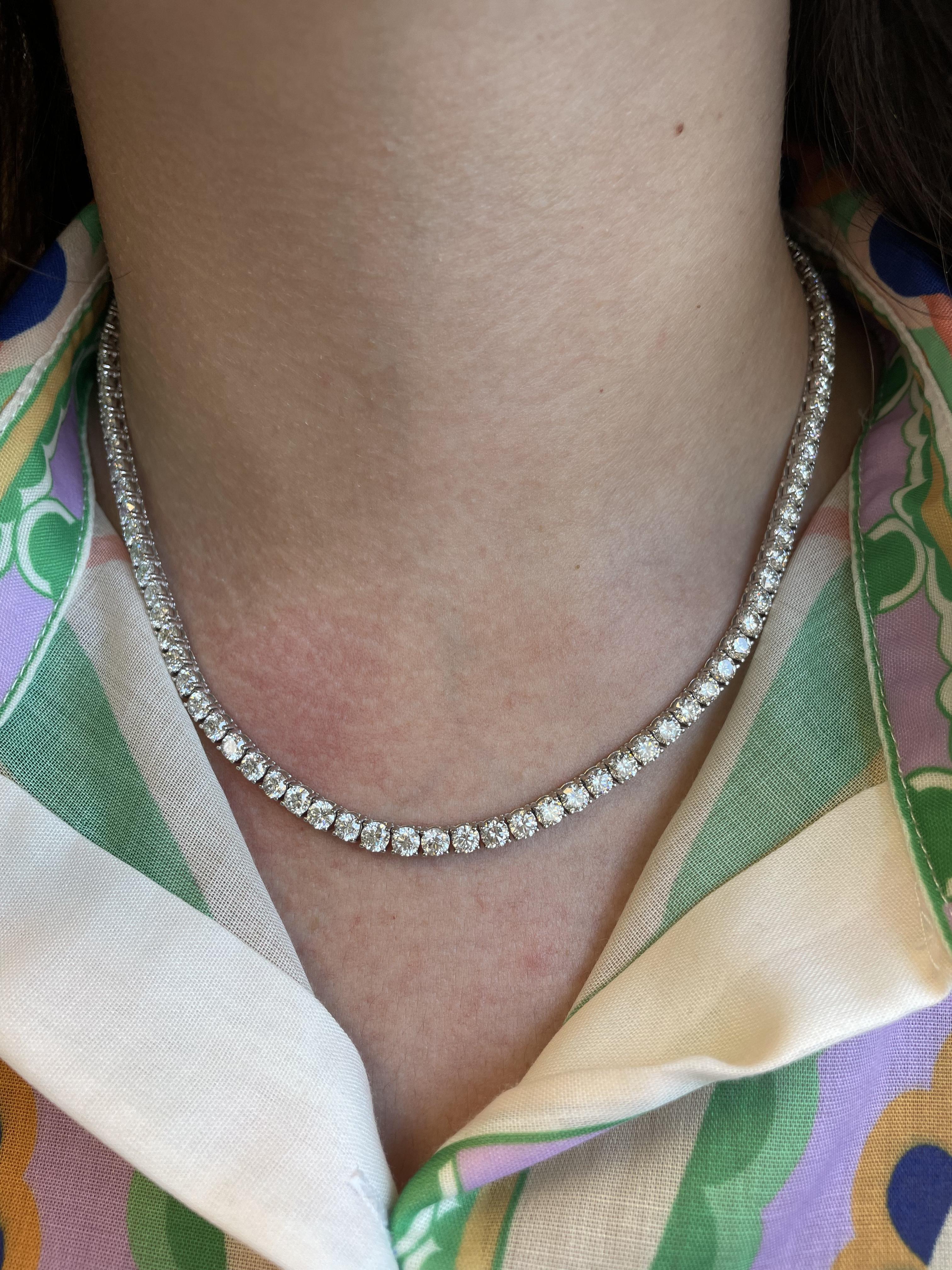 Beautiful and classic diamond tennis necklace. High jewelry by Alexander Beverly Hills.
100 round brilliant diamonds, 23.34ct. Approximately F/G color and SI1 clarity. 18-karat white gold, 30.27 grams, 16.5in.
Accommodated with an up-to-date digital