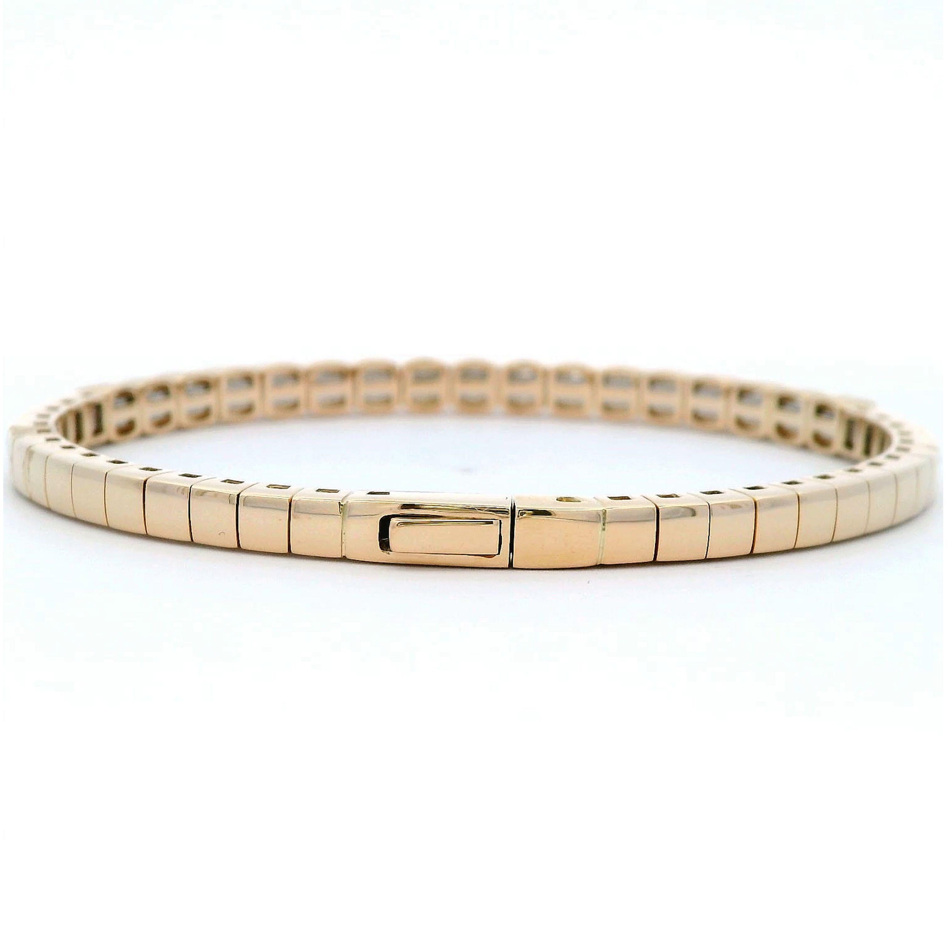 Exquisite modern diamond flexible tennis bracelet / bangle, by Alexander Beverly Hills.
59 round diamonds, 2.58 carats. Approximately I/J color and SI clarity. 14-karat yellow gold, 10.13 grams, 7in.
Accommodated with an up-to-date digital appraisal