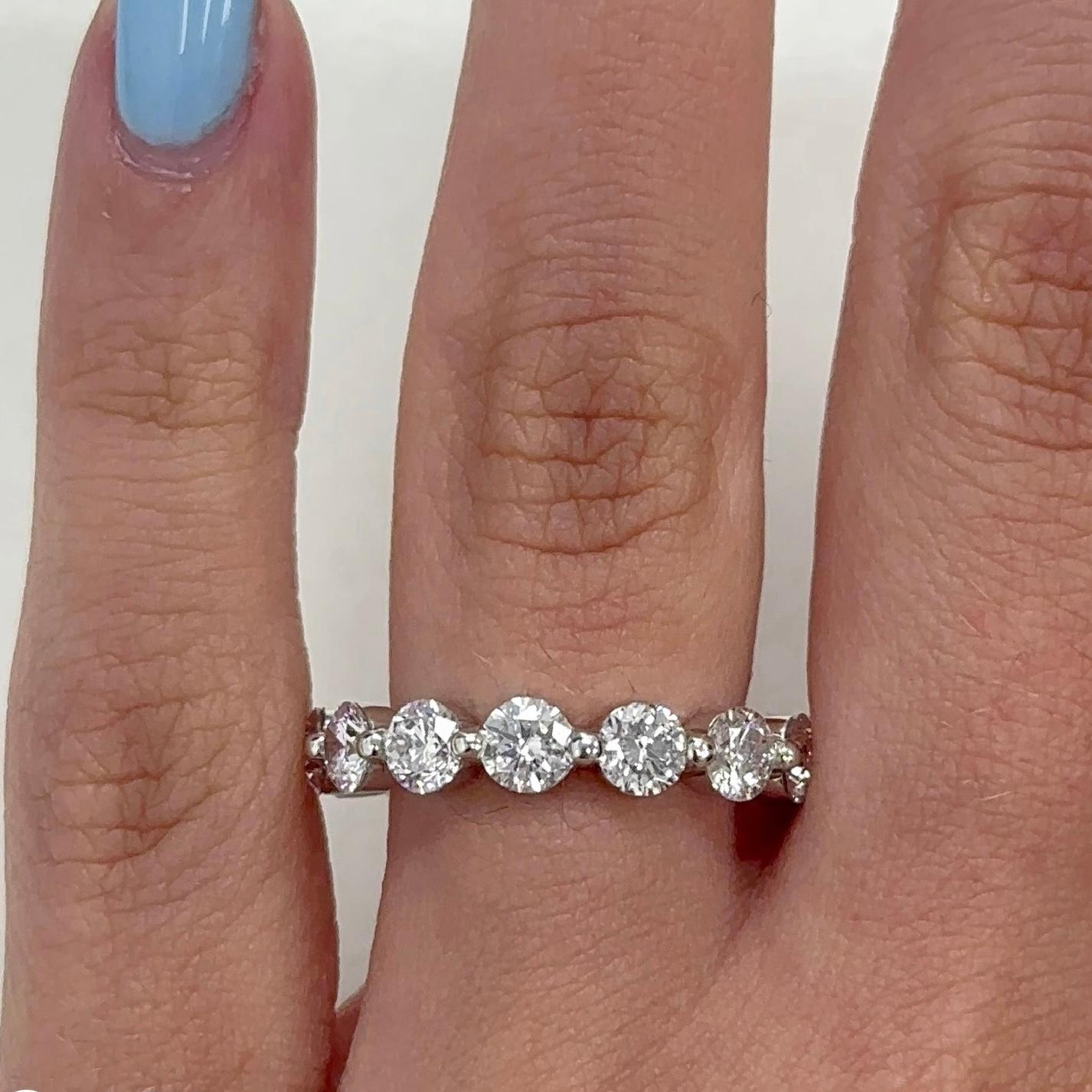 Timeless diamond eternity band. By Alexander Beverly Hills.
14 round brilliant diamonds, 3.34 carats. Approximately F/G color and SI1 clarity. Set in 18k white gold, 4.00 grams, size 6.5. 
Accommodated with an up-to-date appraisal by a GIA G.G. once