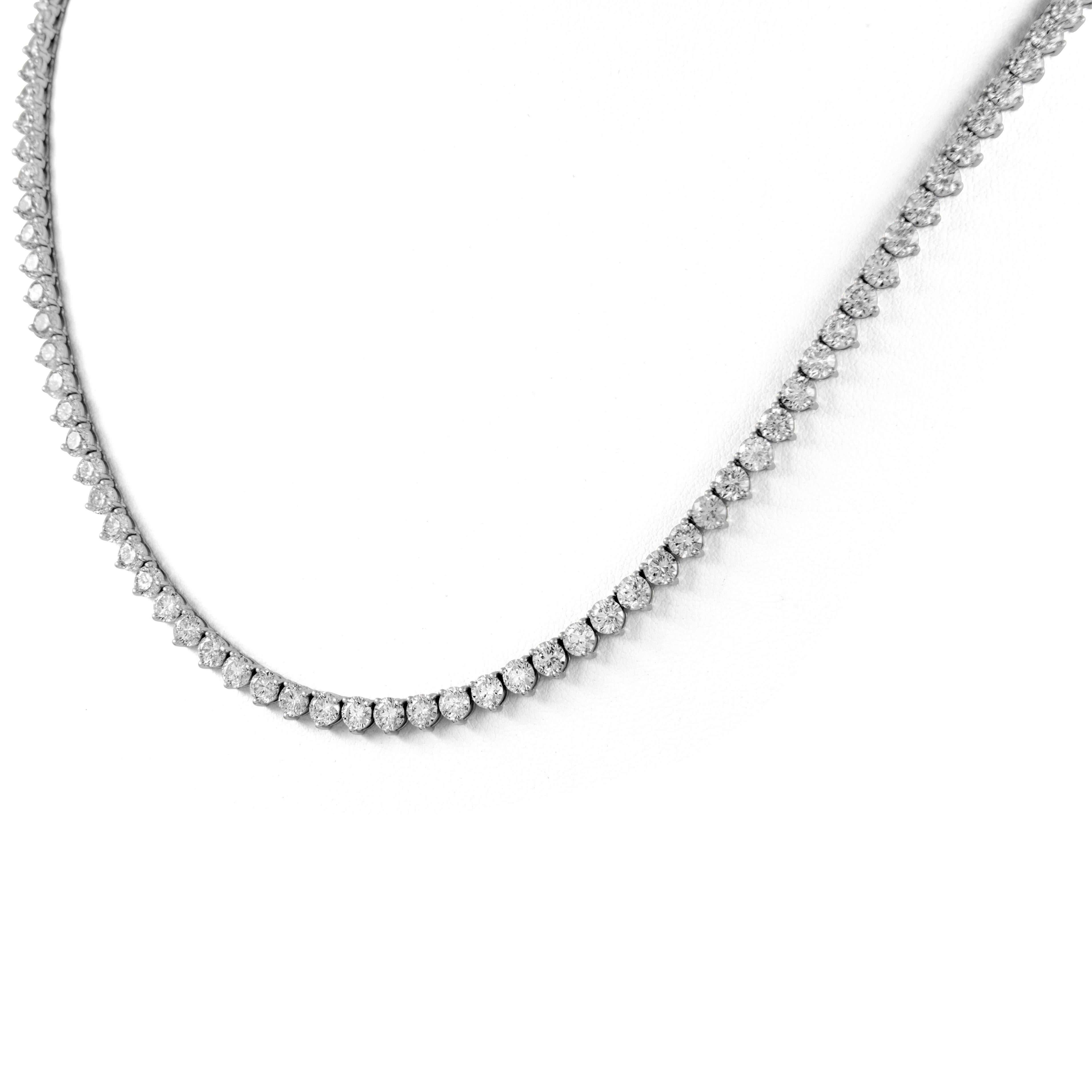 Beautiful and classic diamond tennis necklace. High jewelry by Alexander Beverly Hills.
141 round brilliant diamonds, 35.66ct. Approximately G/H color and VS1/VS2 clarity. 18-karat white gold, 34.50 grams, 24in.
Accommodated with an up-to-date