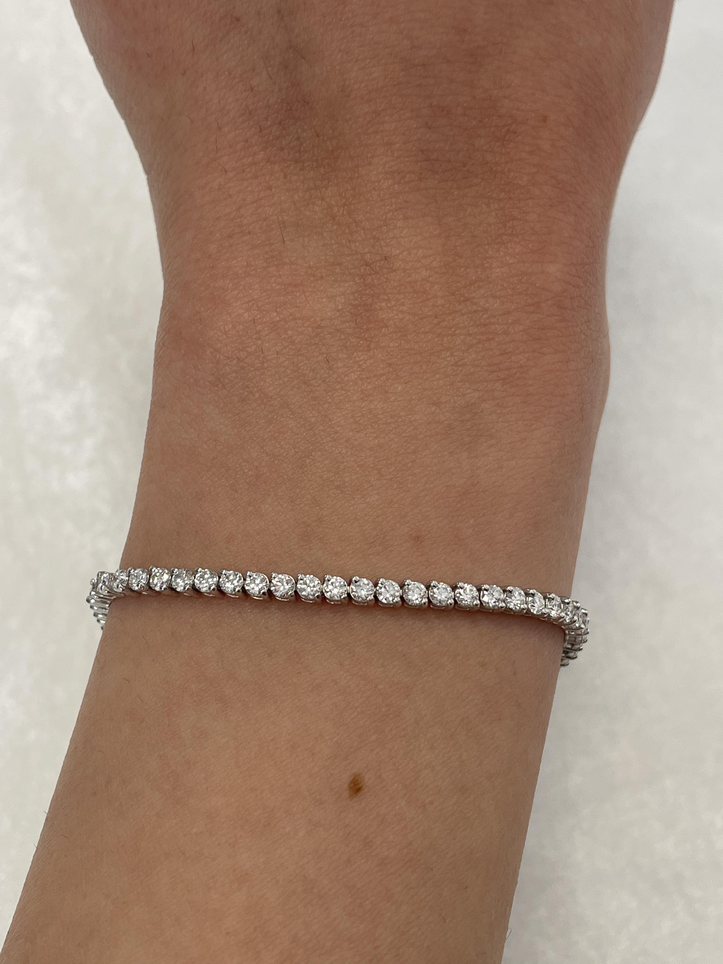 Exquisite and timeless 2-prong diamonds tennis bracelet, by Alexander Beverly Hills.
68 round brilliant diamonds, 3.61 carats total. Approximately F/G color and VVS2/VS1 clarity. Two prong set in 18-karat white gold, 8.15 grams, 7