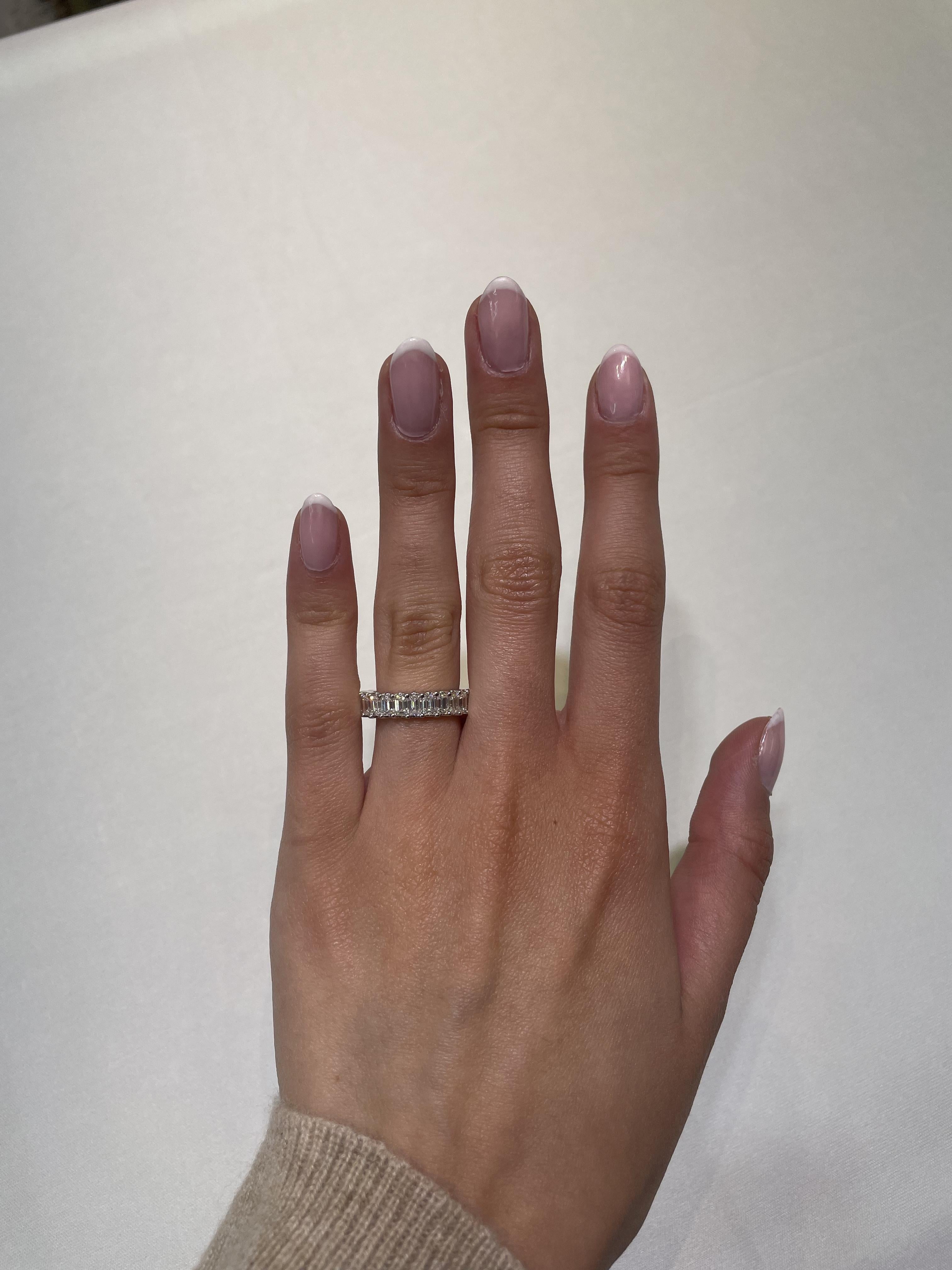 Stunning emerald cut diamond eternity band, by Alexander Beverly Hills.
25 emerald cut diamonds, 3.77 carats total. D-F color and VVS2 clarity. U prong set in 18k white gold, 3.69 grams, size 5.25. 
Accommodated with an up-to-date appraisal by a GIA