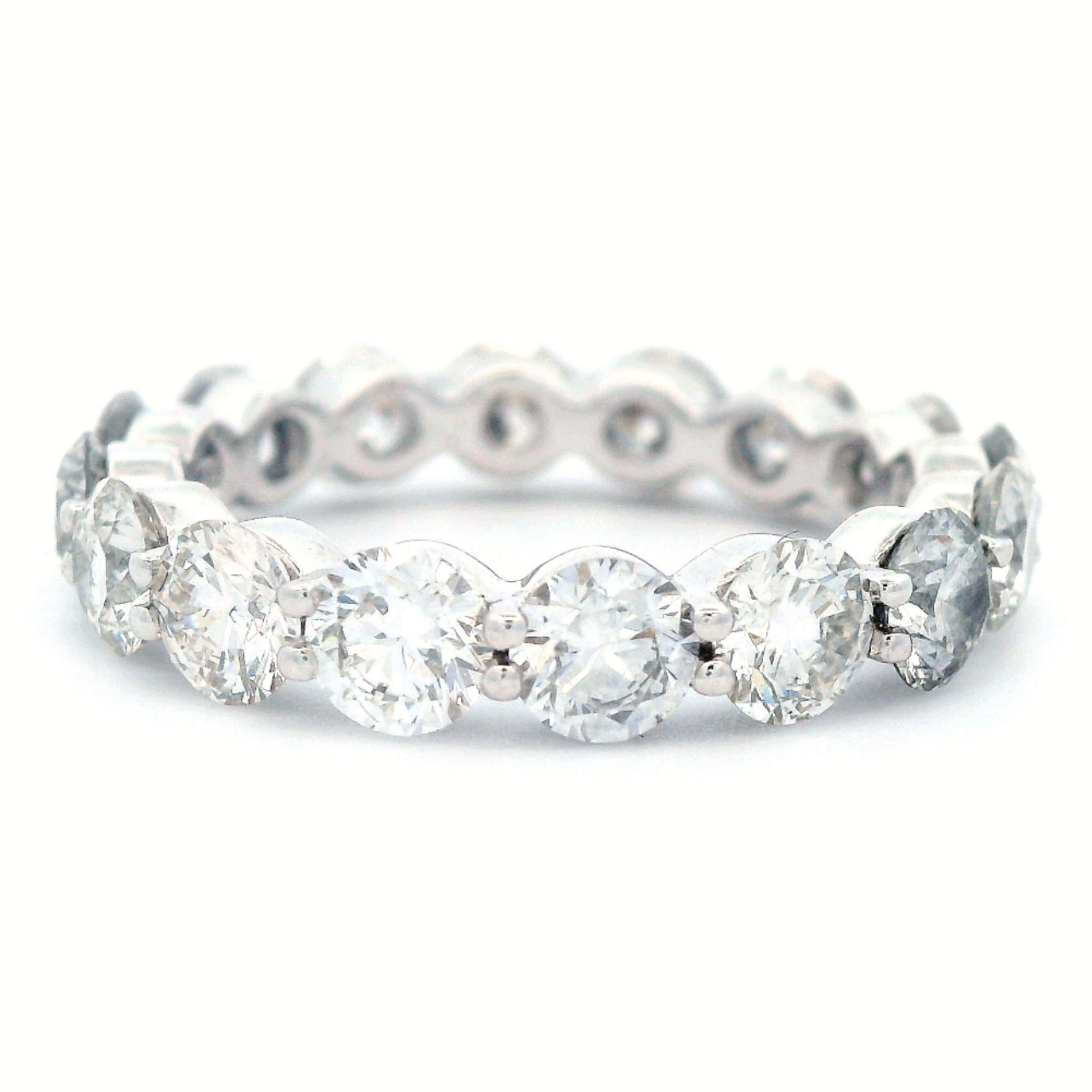 Stunning round diamond eternity band, by Alexander Beverly Hills.
16 round brilliant diamonds, 3.88 carats total. G color and VS clarity. Set in 18k white gold, 2.99 grams, size 6.25, double shared prong setting. 
Accommodated with an up-to-date