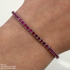 Alexander Beverly Hills Tennisarmband aus 4,72 Karat gemischten Rubinen und rosa Saphiren 18k