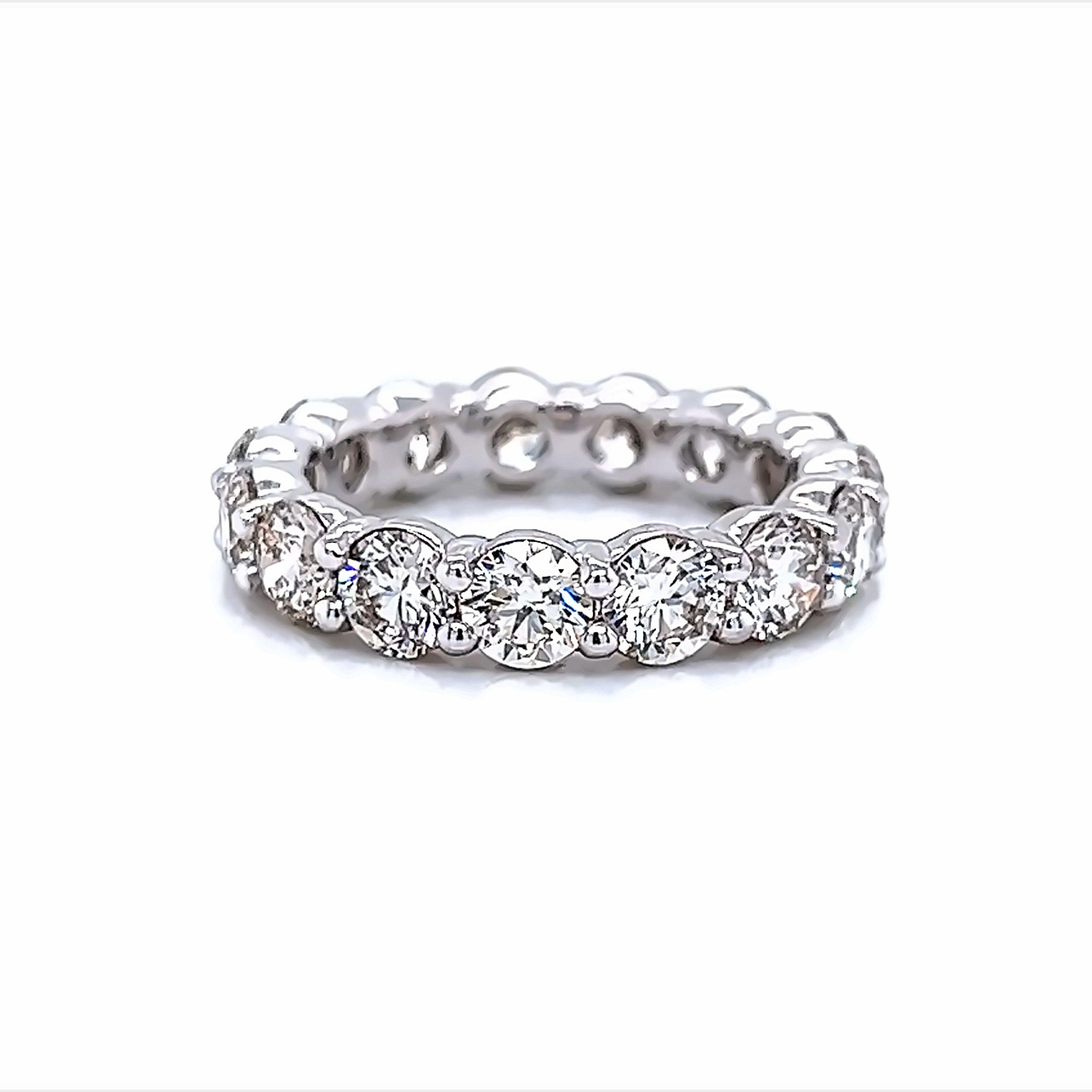Timeless diamond eternity band. By Alexander Beverly Hills.
15 round brilliant diamonds, 4.85 carats. Approximately H/I color and VS clarity. U prong set in 18k white gold, 3.34 grams, size 5.25.
Accommodated with an up-to-date appraisal by a GIA