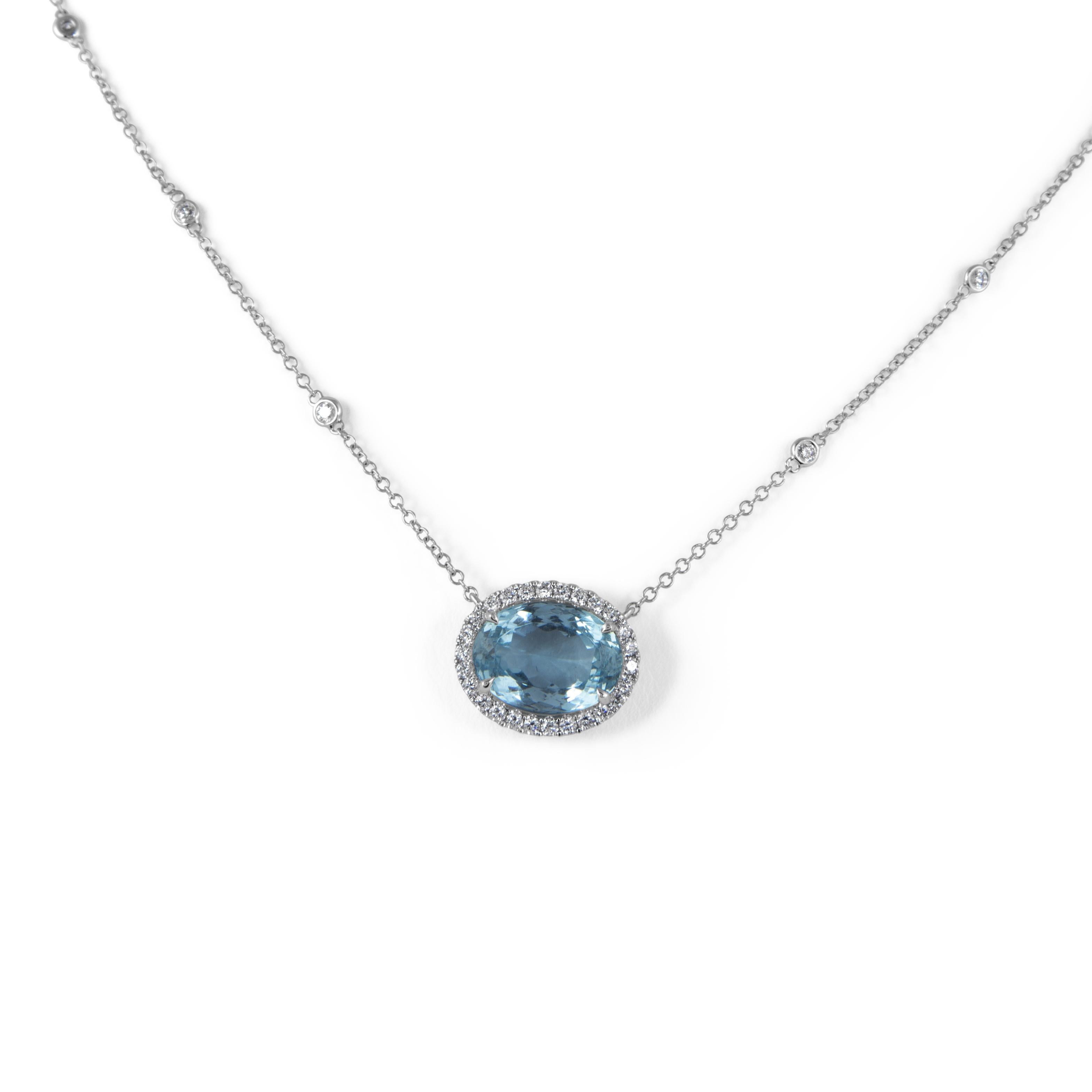 Lovely santa maria color oval aquamarine and diamond pendant necklace, by Alexander Beverly Hills.
5.42 carats total gemstone weight.
4.85 carat oval aquamarine beryl. 36 round brilliant diamonds, 0.57 carats. Approximately F color and VS2 clarity.